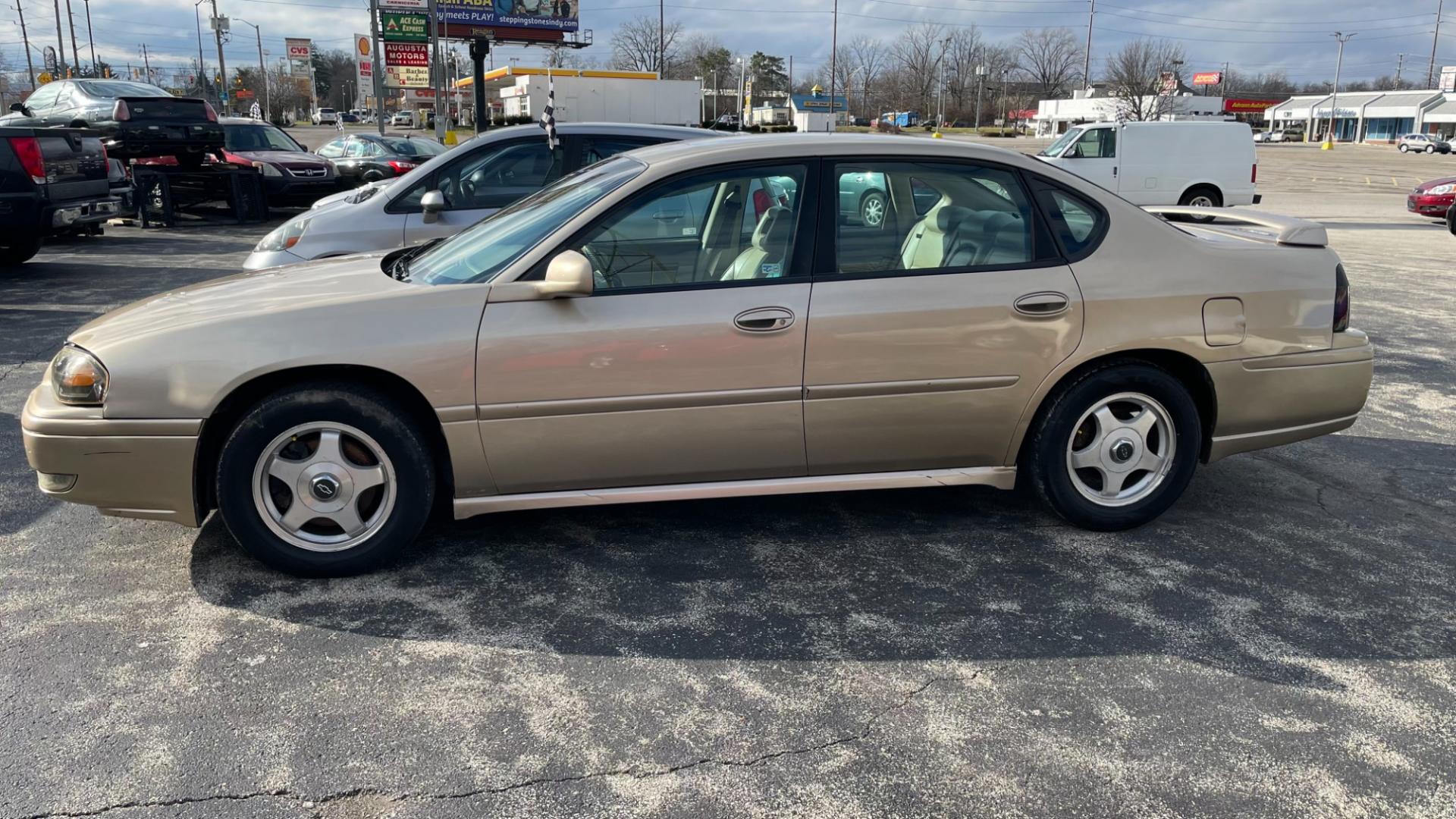 2005 Gold /Biege Chevrolet Impala LS (2G1WH52K059) with an 3.8L V6 OHV 12V engine, 4-Speed Automatic Overdrive transmission, located at 2710A Westlane Rd., Indianapolis, IN, 46268, (317) 291-2000, 39.885670, -86.208160 - Photo#3