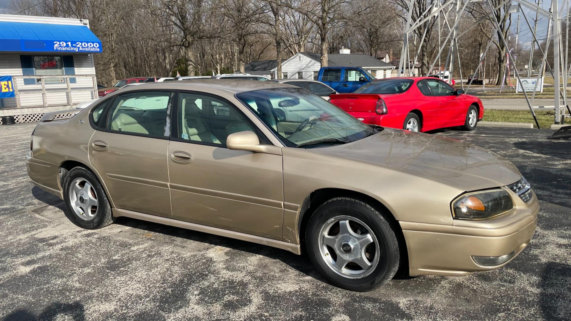 2005 Gold /Biege Chevrolet Impala LS (2G1WH52K059) with an 3.8L V6 OHV 12V engine, 4-Speed Automatic Overdrive transmission, located at 2710A Westlane Rd., Indianapolis, IN, 46268, (317) 291-2000, 39.885670, -86.208160 - Photo#4