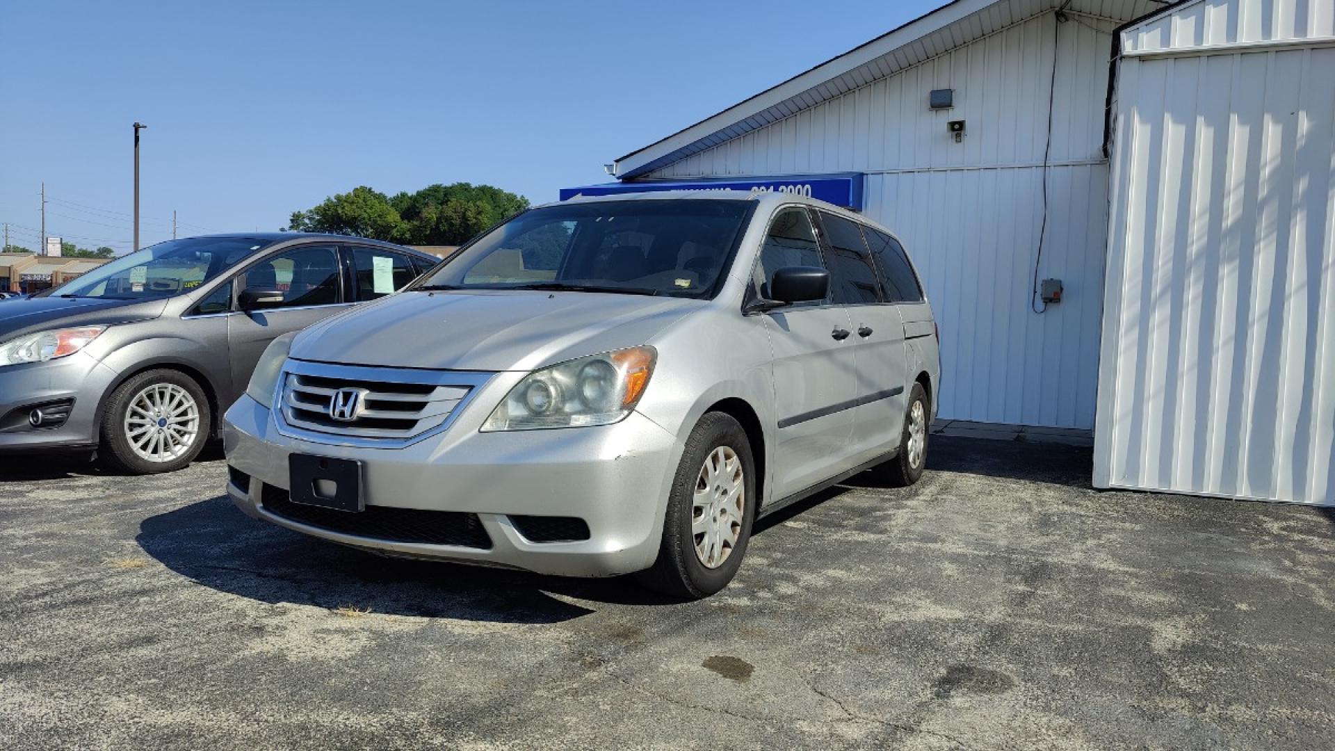 2009 Honda Odyssey LX (5FNRL38279B) with an 3.5L V6 SOHC 24V engine, 5-Speed Automatic transmission, located at 2710A Westlane Rd., Indianapolis, IN, 46268, (317) 291-2000, 39.885670, -86.208160 - Photo#1