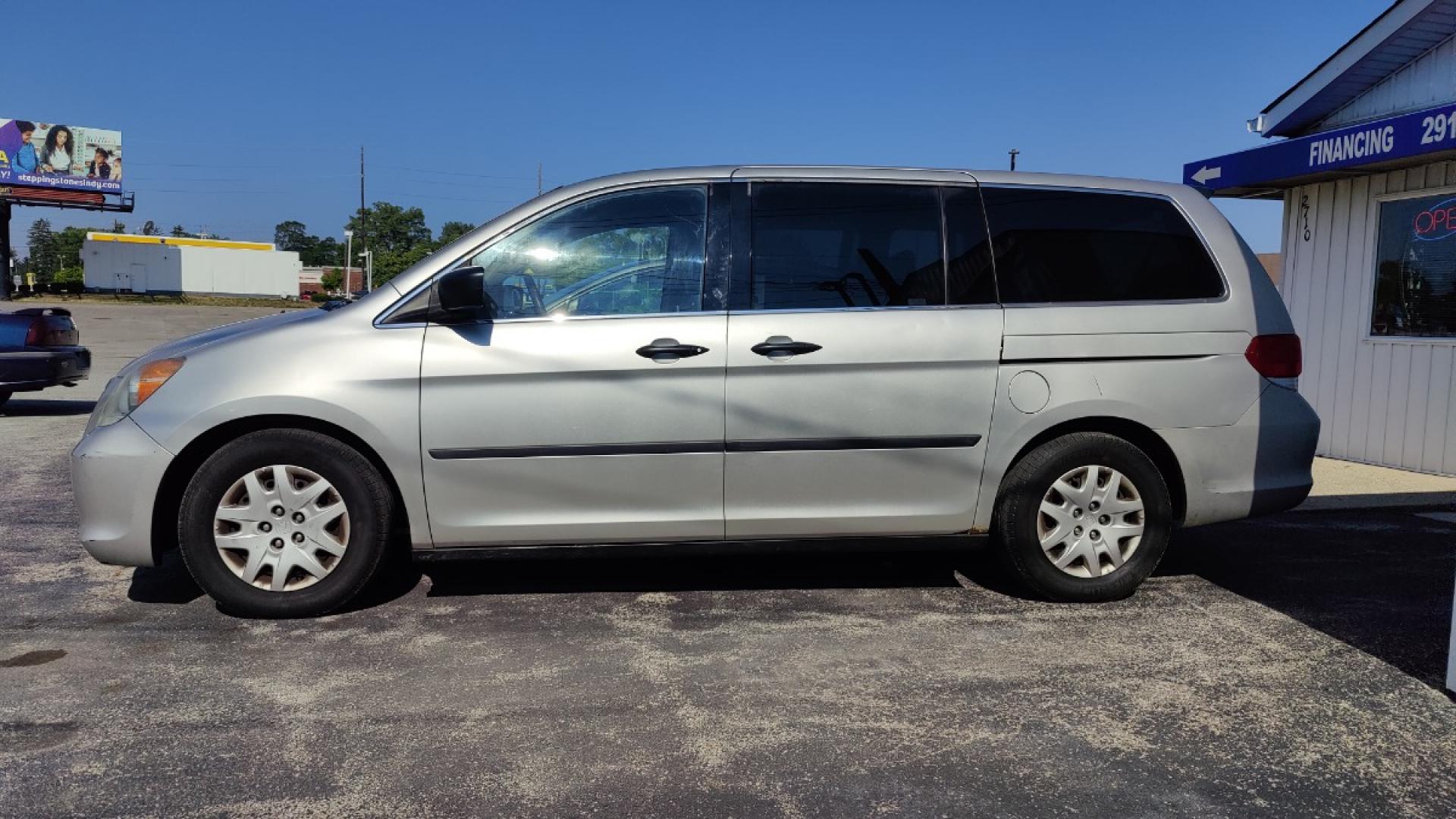 2009 Honda Odyssey LX (5FNRL38279B) with an 3.5L V6 SOHC 24V engine, 5-Speed Automatic transmission, located at 2710A Westlane Rd., Indianapolis, IN, 46268, (317) 291-2000, 39.885670, -86.208160 - Photo#2