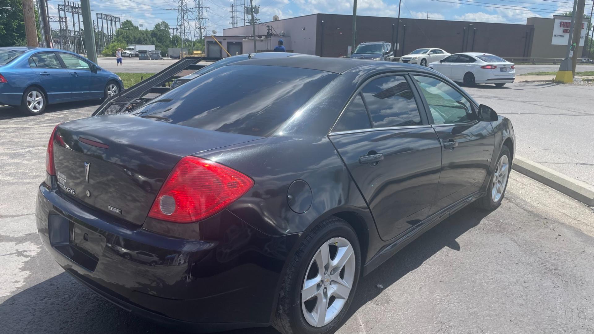 2010 BLACK /BLACK Pontiac G6 Base (1G2ZA5E01A4) with an 2.4L L4 DOHC 16V engine, 4-Speed Automatic transmission, located at 2710A Westlane Rd., Indianapolis, IN, 46268, (317) 291-2000, 39.885670, -86.208160 - Photo#2