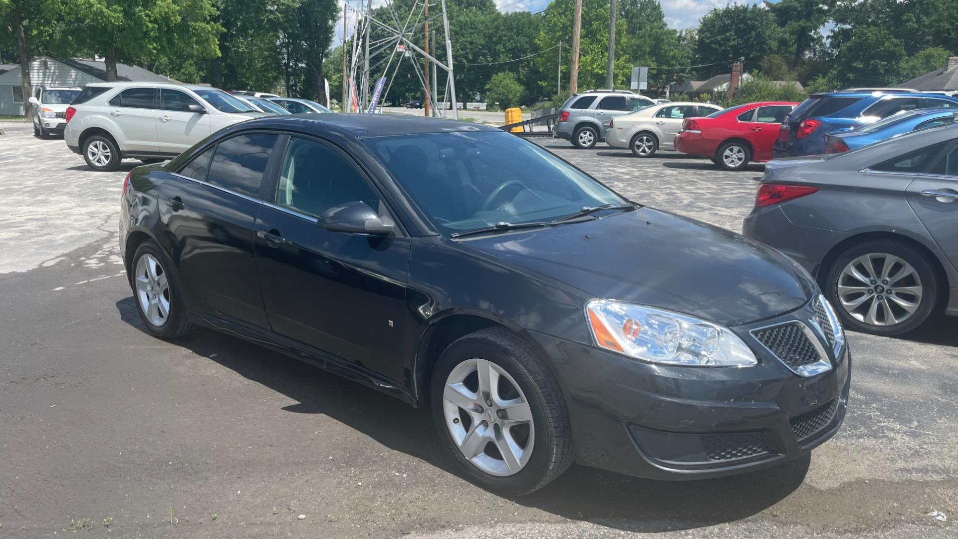 2010 BLACK /BLACK Pontiac G6 Base (1G2ZA5E01A4) with an 2.4L L4 DOHC 16V engine, 4-Speed Automatic transmission, located at 2710A Westlane Rd., Indianapolis, IN, 46268, (317) 291-2000, 39.885670, -86.208160 - Photo#1