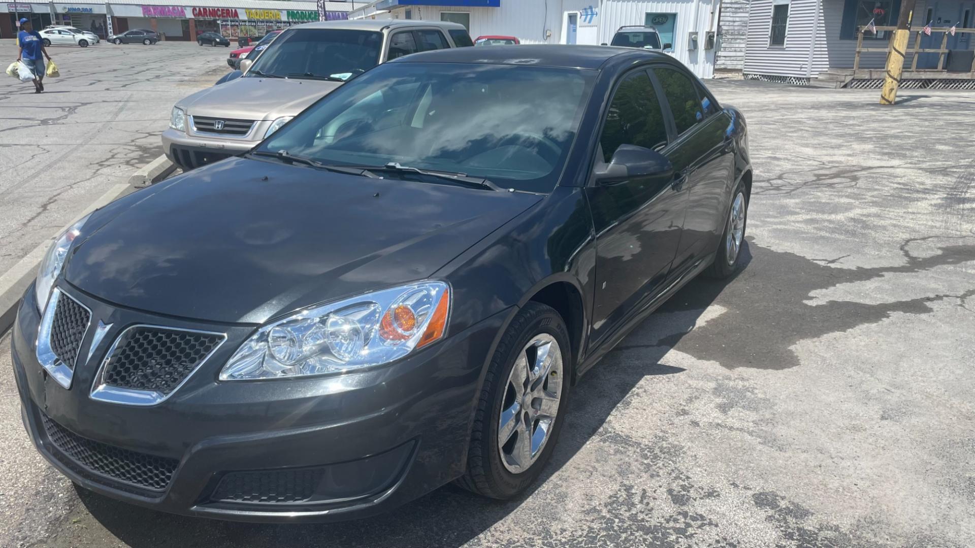 2010 BLACK /BLACK Pontiac G6 Base (1G2ZA5E01A4) with an 2.4L L4 DOHC 16V engine, 4-Speed Automatic transmission, located at 2710A Westlane Rd., Indianapolis, IN, 46268, (317) 291-2000, 39.885670, -86.208160 - Photo#0