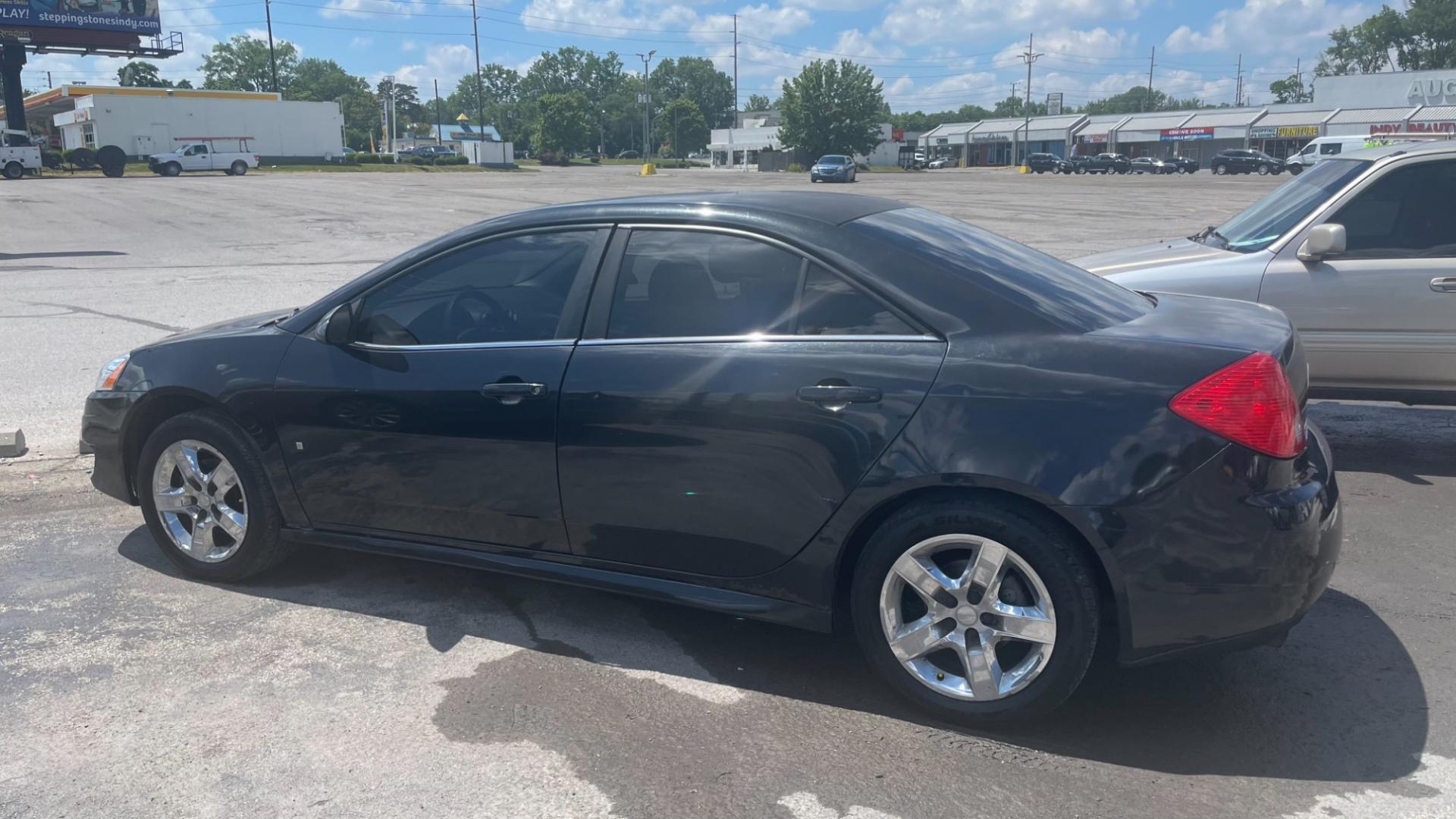 2010 BLACK /BLACK Pontiac G6 Base (1G2ZA5E01A4) with an 2.4L L4 DOHC 16V engine, 4-Speed Automatic transmission, located at 2710A Westlane Rd., Indianapolis, IN, 46268, (317) 291-2000, 39.885670, -86.208160 - Photo#5