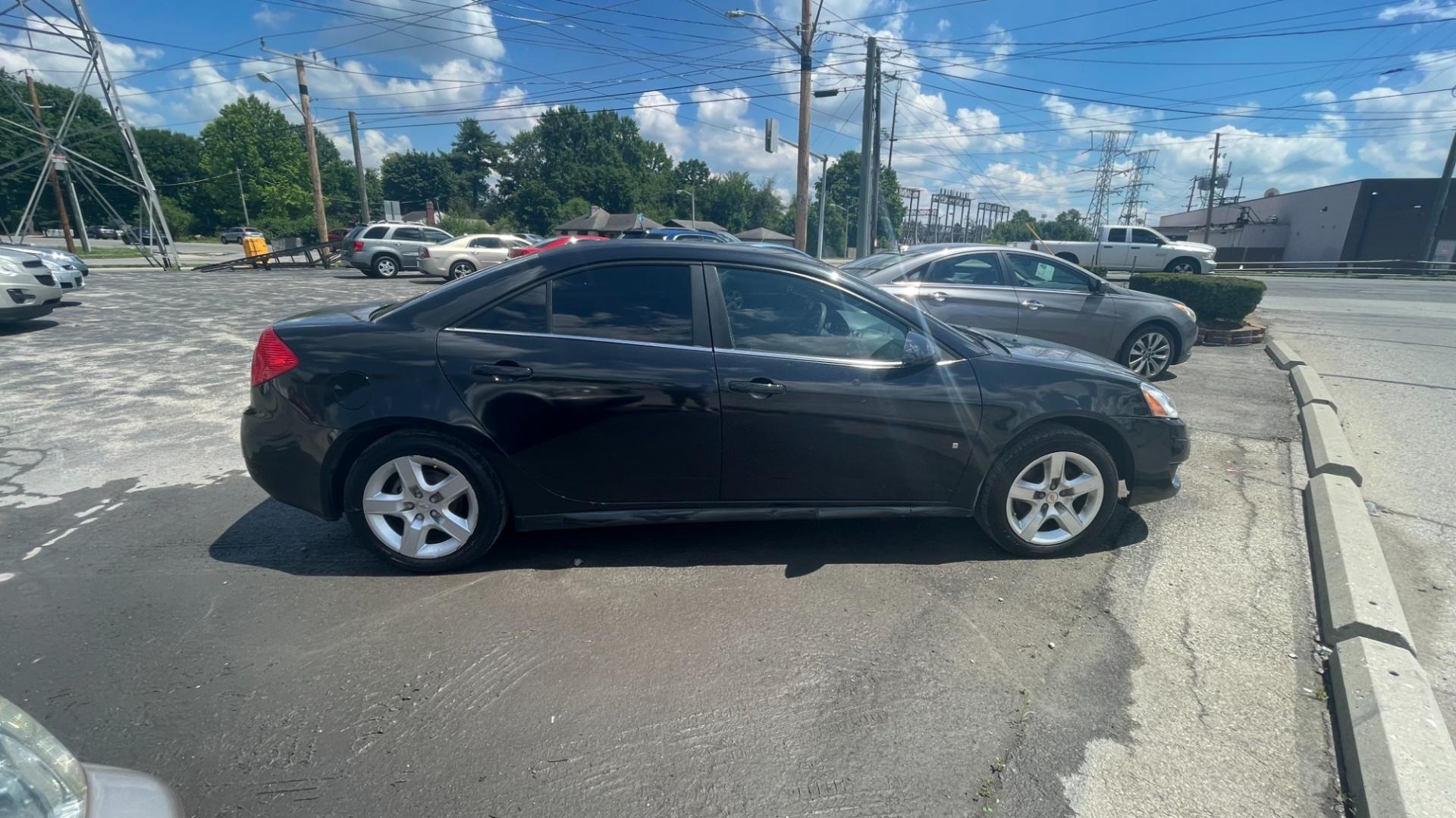 2010 BLACK /BLACK Pontiac G6 Base (1G2ZA5E01A4) with an 2.4L L4 DOHC 16V engine, 4-Speed Automatic transmission, located at 2710A Westlane Rd., Indianapolis, IN, 46268, (317) 291-2000, 39.885670, -86.208160 - Photo#4