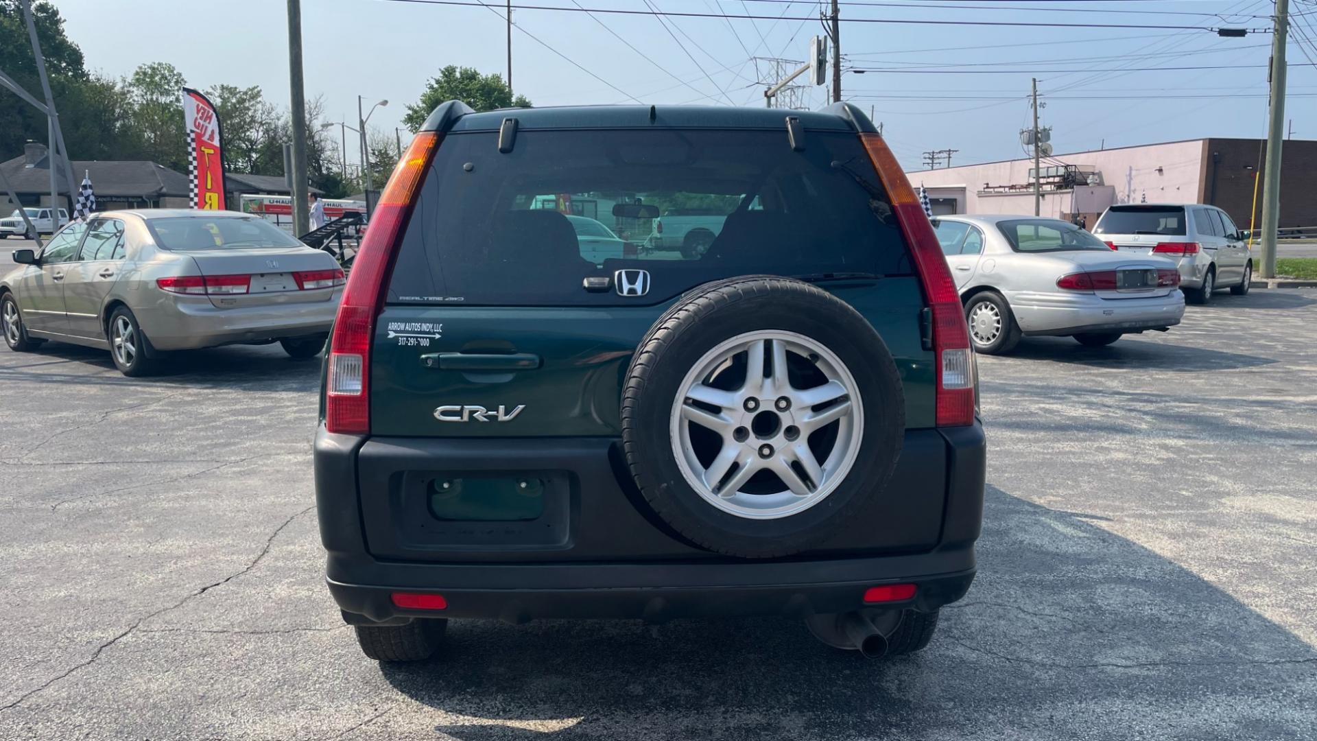 2004 GREEN /BEIGE Honda CR-V EX 4WD AT (SHSRD78824U) with an 2.4L L4 DOHC 16V engine, 4-Speed Automatic Overdrive transmission, located at 2710A Westlane Rd., Indianapolis, IN, 46268, (317) 291-2000, 39.885670, -86.208160 - Photo#2