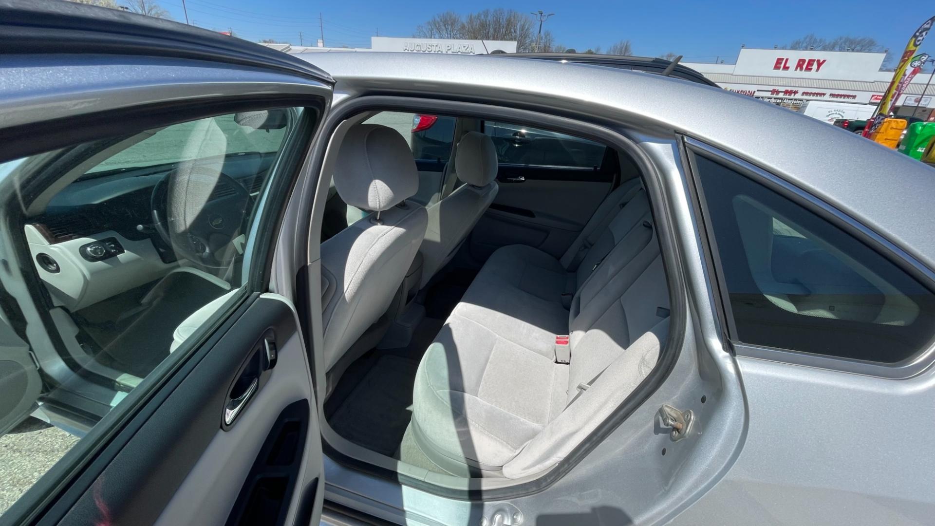 2013 Chevrolet Impala LT (Fleet) (2G1WG5E32D1) with an 3.6L V6 DOHC 16V FFV engine, 6-Speed Automatic transmission, located at 2710A Westlane Rd., Indianapolis, IN, 46268, (317) 291-2000, 39.885670, -86.208160 - Photo#4