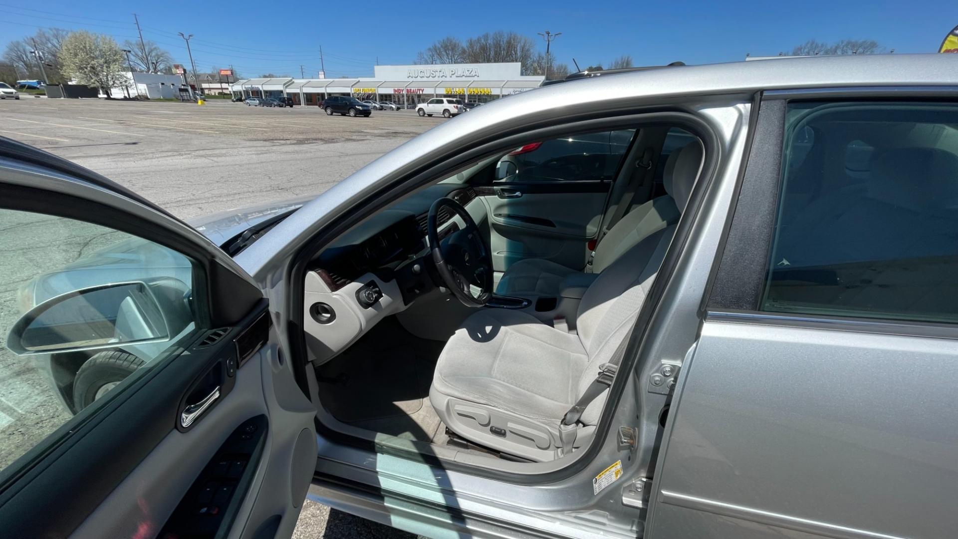 2013 Chevrolet Impala LT (Fleet) (2G1WG5E32D1) with an 3.6L V6 DOHC 16V FFV engine, 6-Speed Automatic transmission, located at 2710A Westlane Rd., Indianapolis, IN, 46268, (317) 291-2000, 39.885670, -86.208160 - Photo#5