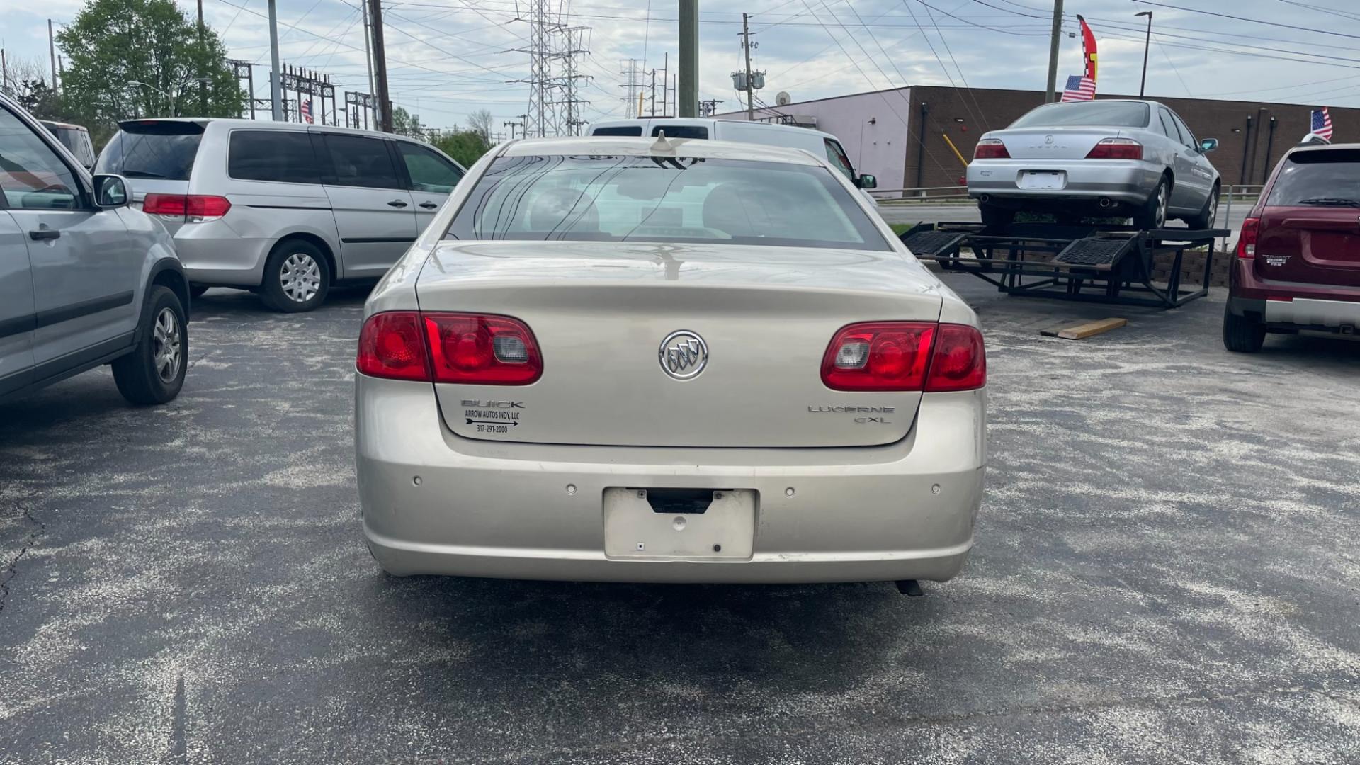 2009 /BEIGE Buick Lucerne CXL1 (1G4HD57139U) with an 3.9L V6 OHV 12V FFV engine, 4-Speed Automatic transmission, located at 2710A Westlane Rd., Indianapolis, IN, 46268, (317) 291-2000, 39.885670, -86.208160 - Photo#3