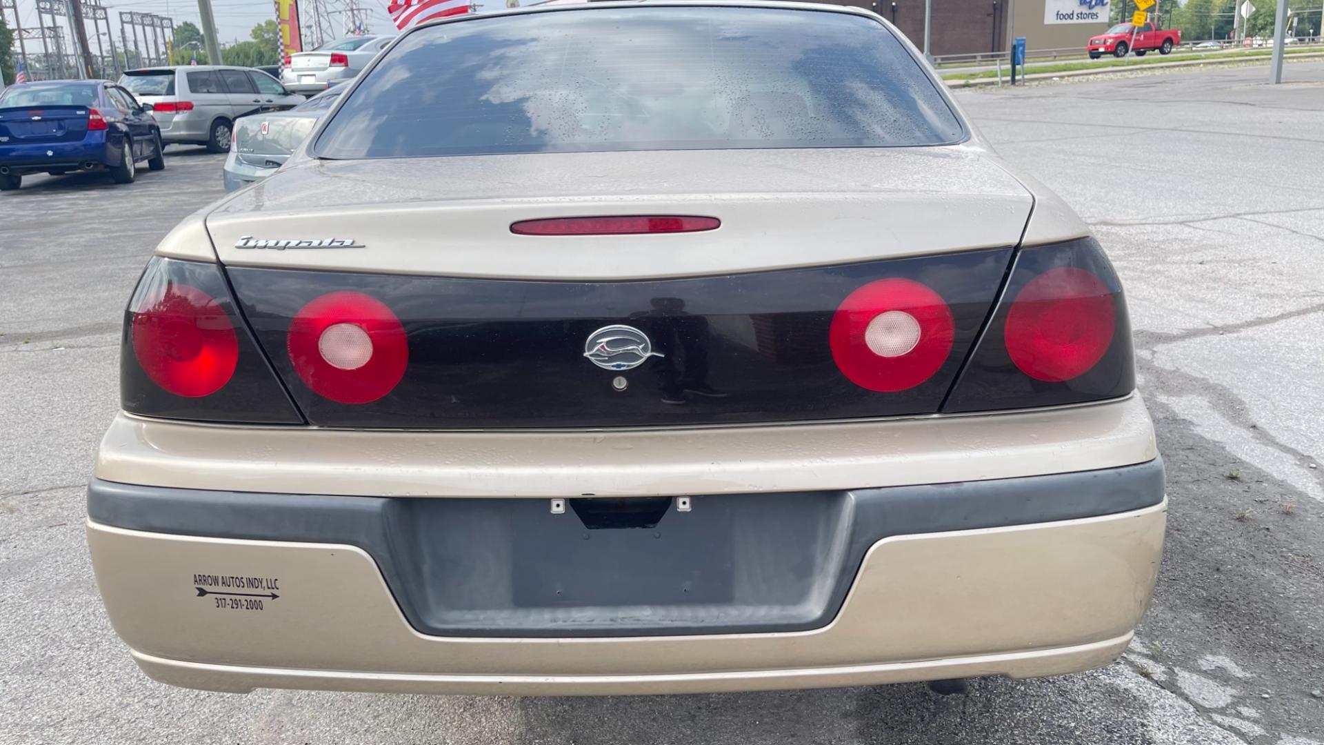 2004 GOLD /TAN Chevrolet Impala Base (2G1WF52E349) with an 3.4L V6 OHV 12V engine, 4-Speed Automatic Overdrive transmission, located at 2710A Westlane Rd., Indianapolis, IN, 46268, (317) 291-2000, 39.885670, -86.208160 - Photo#3