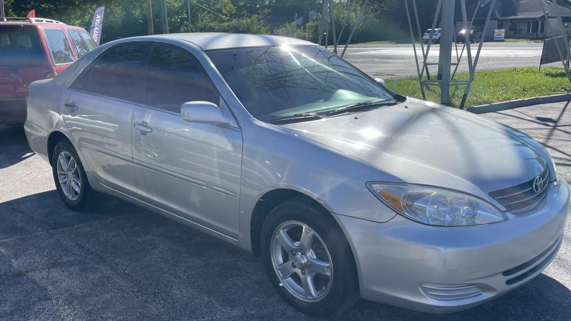 2002 Silver /GRAY Toyota Camry LE (4T1BE32K72U) with an 2.4L L4 DOHC 16V engine, located at 2710A Westlane Rd., Indianapolis, IN, 46268, (317) 291-2000, 39.885670, -86.208160 - Photo#2