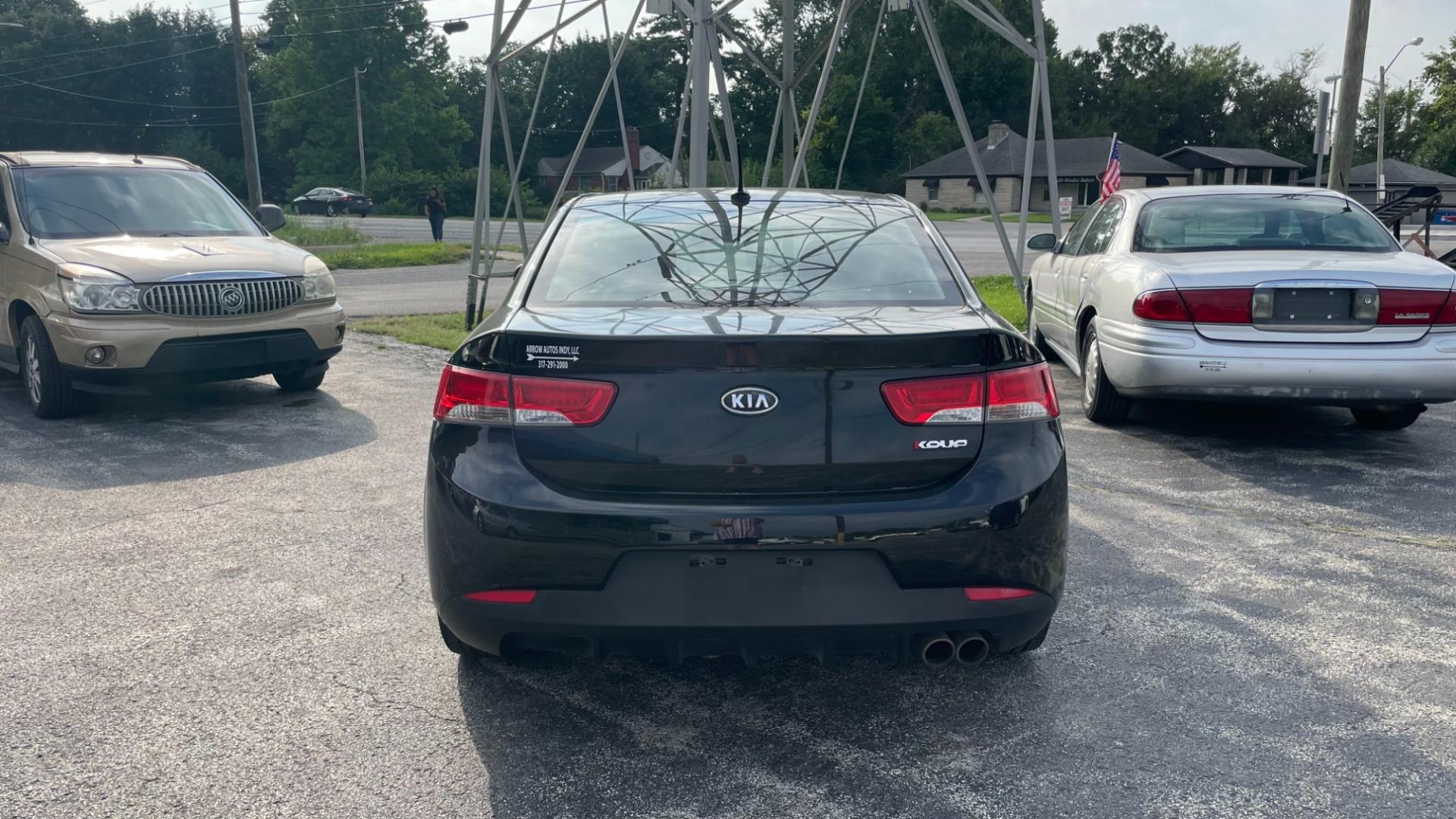 2011 /BLACK Kia Forte Koup SX (KNAFW6A36B5) with an 2.4L L4 DOHC 16V engine, located at 2710A Westlane Rd., Indianapolis, IN, 46268, (317) 291-2000, 39.885670, -86.208160 - Photo#9