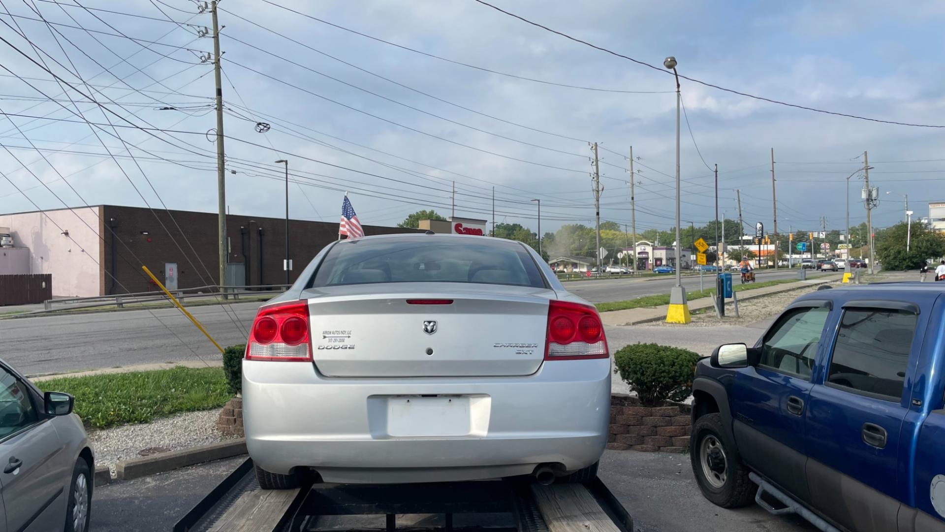 2010 Silver Dodge Charger SXT (2B3CA3CV1AH) with an 3.5L V6 SOHC 24V engine, 5-Speed Automatic transmission, located at 2710A Westlane Rd., Indianapolis, IN, 46268, (317) 291-2000, 39.885670, -86.208160 - Photo#1