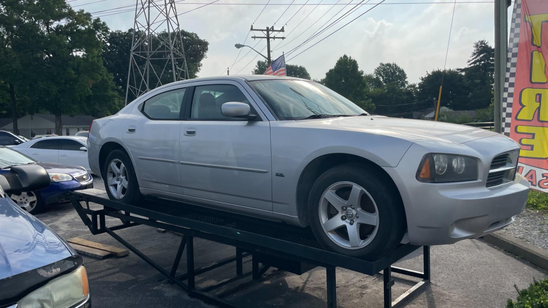 2010 Silver Dodge Charger SXT (2B3CA3CV1AH) with an 3.5L V6 SOHC 24V engine, 5-Speed Automatic transmission, located at 2710A Westlane Rd., Indianapolis, IN, 46268, (317) 291-2000, 39.885670, -86.208160 - Photo#2