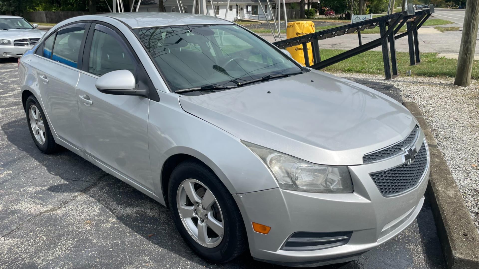 2013 Chevrolet Cruze 1LT Auto (1G1PC5SB5D7) with an 1.4L L4 DOHC 16V TURBO engine, 6-Speed Automatic transmission, located at 2710A Westlane Rd., Indianapolis, IN, 46268, (317) 291-2000, 39.885670, -86.208160 - Photo#2