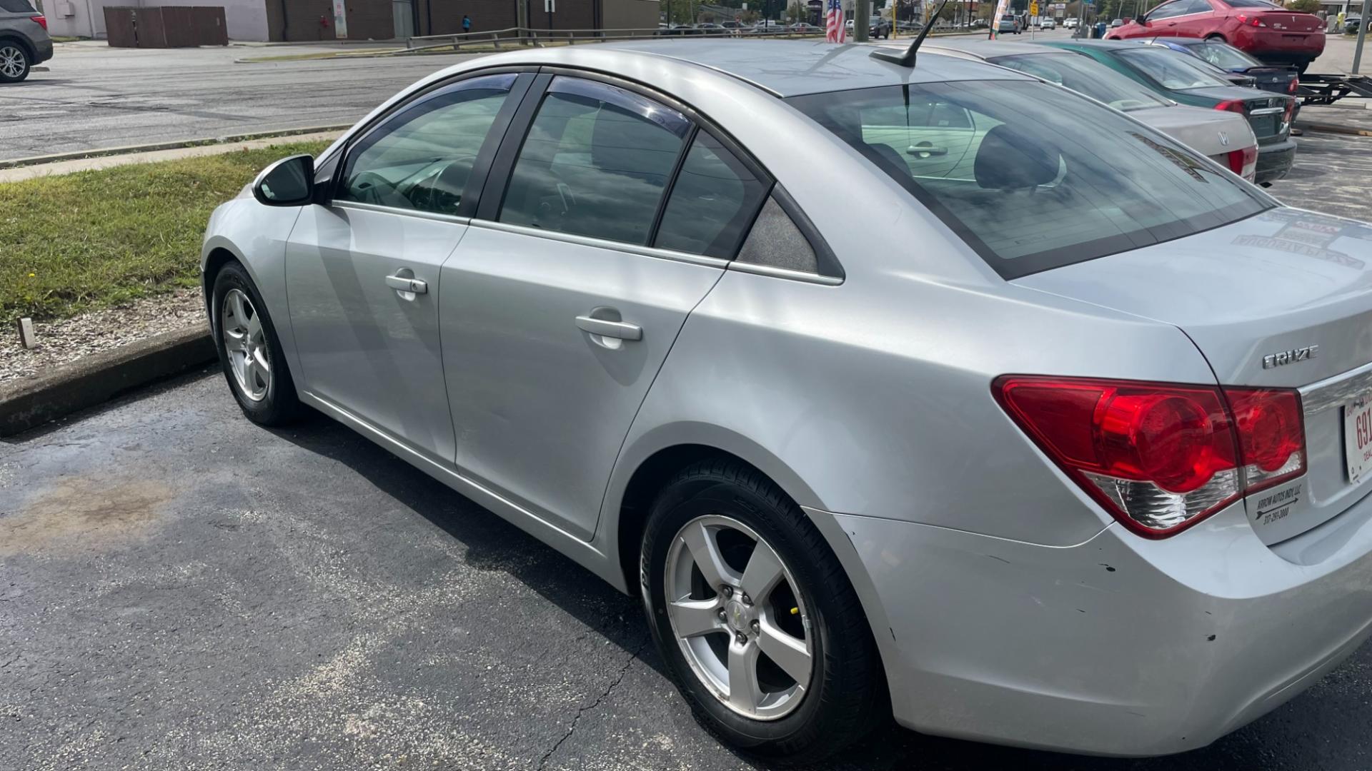 2013 Chevrolet Cruze 1LT Auto (1G1PC5SB5D7) with an 1.4L L4 DOHC 16V TURBO engine, 6-Speed Automatic transmission, located at 2710A Westlane Rd., Indianapolis, IN, 46268, (317) 291-2000, 39.885670, -86.208160 - Photo#4