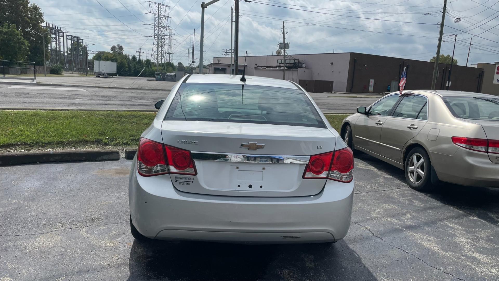 2013 Chevrolet Cruze 1LT Auto (1G1PC5SB5D7) with an 1.4L L4 DOHC 16V TURBO engine, 6-Speed Automatic transmission, located at 2710A Westlane Rd., Indianapolis, IN, 46268, (317) 291-2000, 39.885670, -86.208160 - Photo#5