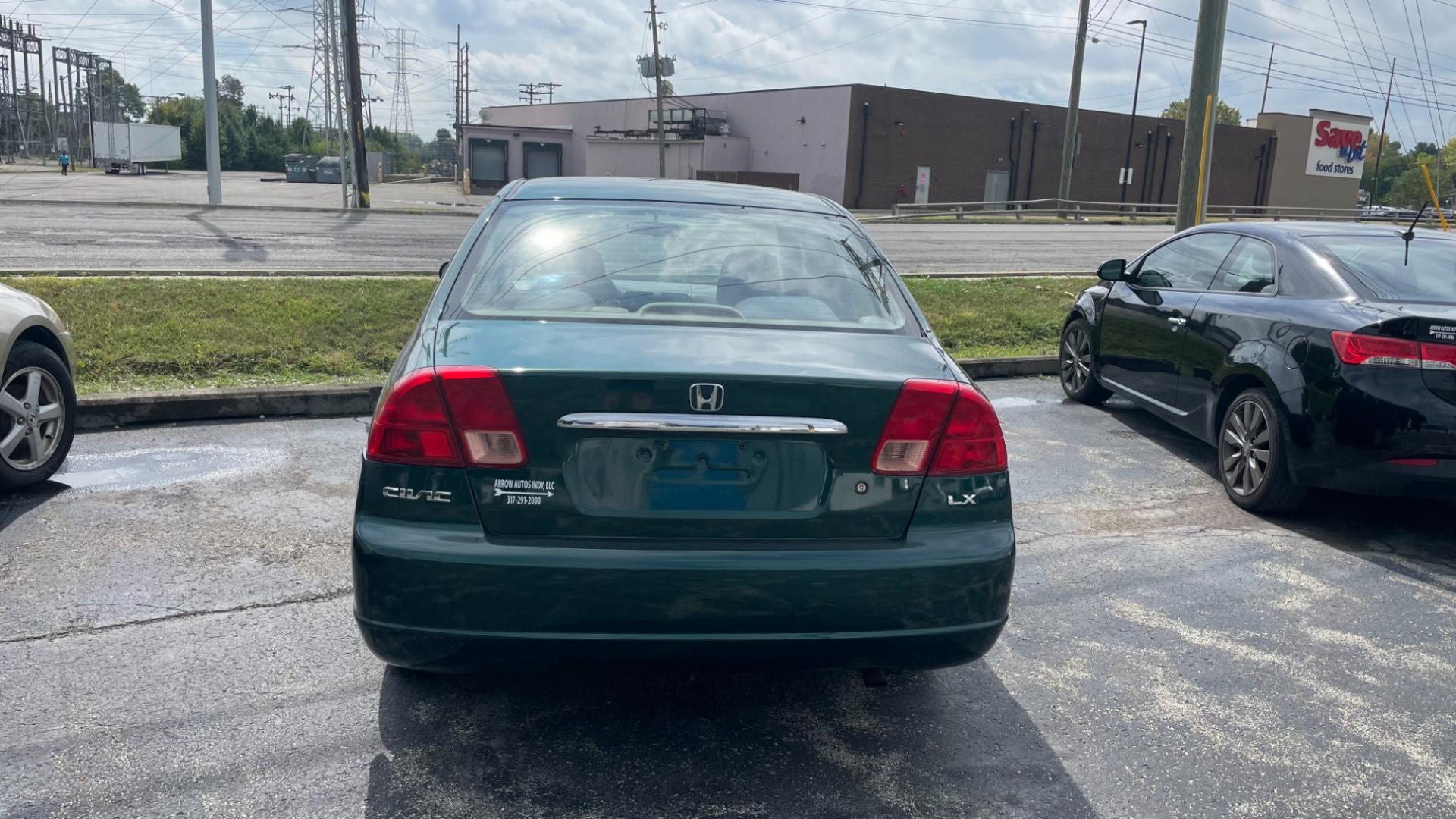 2001 GREEN /TAN Honda Civic LX sedan (1HGES16571L) with an 1.7L L4 SOHC 16V engine, 4-Speed Automatic Overdrive transmission, located at 2710A Westlane Rd., Indianapolis, IN, 46268, (317) 291-2000, 39.885670, -86.208160 - Photo#2