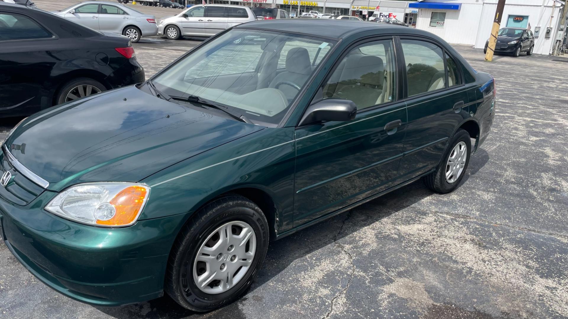 2001 GREEN /TAN Honda Civic LX sedan (1HGES16571L) with an 1.7L L4 SOHC 16V engine, 4-Speed Automatic Overdrive transmission, located at 2710A Westlane Rd., Indianapolis, IN, 46268, (317) 291-2000, 39.885670, -86.208160 - Photo#1