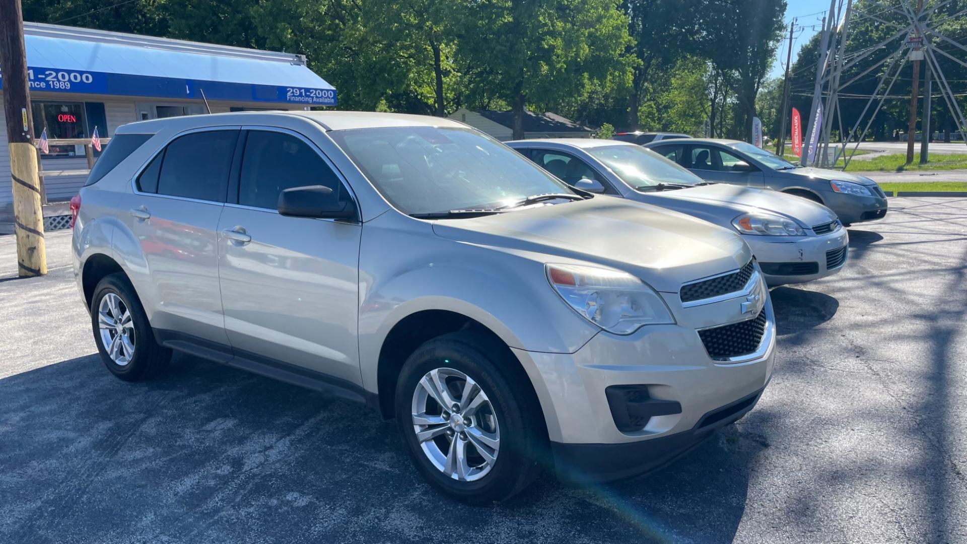 2015 Gold /BLACK Chevrolet Equinox LS (2GNALAEK8F6) with an 2.4L L4 DOHC 16V engine, 6-Speed Automatic transmission, located at 2710A Westlane Rd., Indianapolis, IN, 46268, (317) 291-2000, 39.885670, -86.208160 - Photo#0