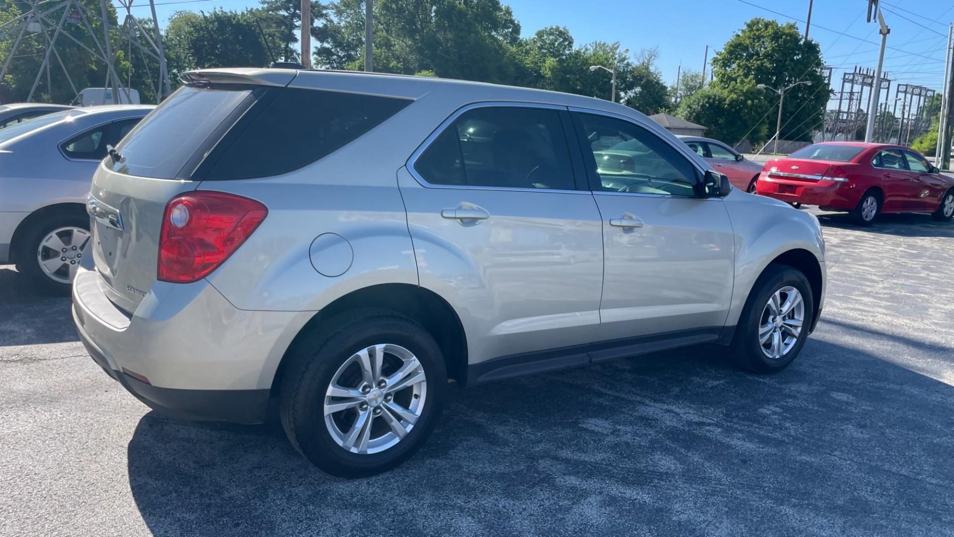 2015 Gold /BLACK Chevrolet Equinox LS (2GNALAEK8F6) with an 2.4L L4 DOHC 16V engine, 6-Speed Automatic transmission, located at 2710A Westlane Rd., Indianapolis, IN, 46268, (317) 291-2000, 39.885670, -86.208160 - Photo#2