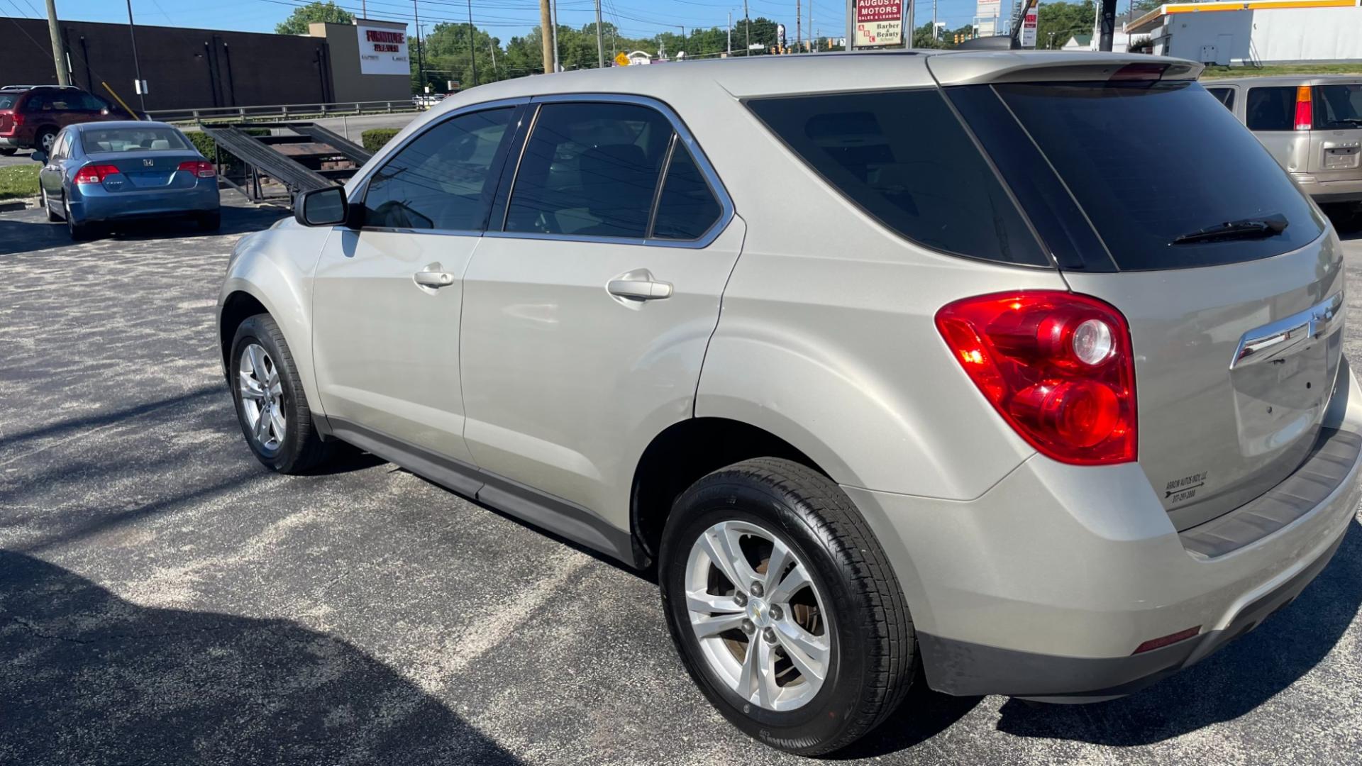 2015 Gold /BLACK Chevrolet Equinox LS (2GNALAEK8F6) with an 2.4L L4 DOHC 16V engine, 6-Speed Automatic transmission, located at 2710A Westlane Rd., Indianapolis, IN, 46268, (317) 291-2000, 39.885670, -86.208160 - Photo#5