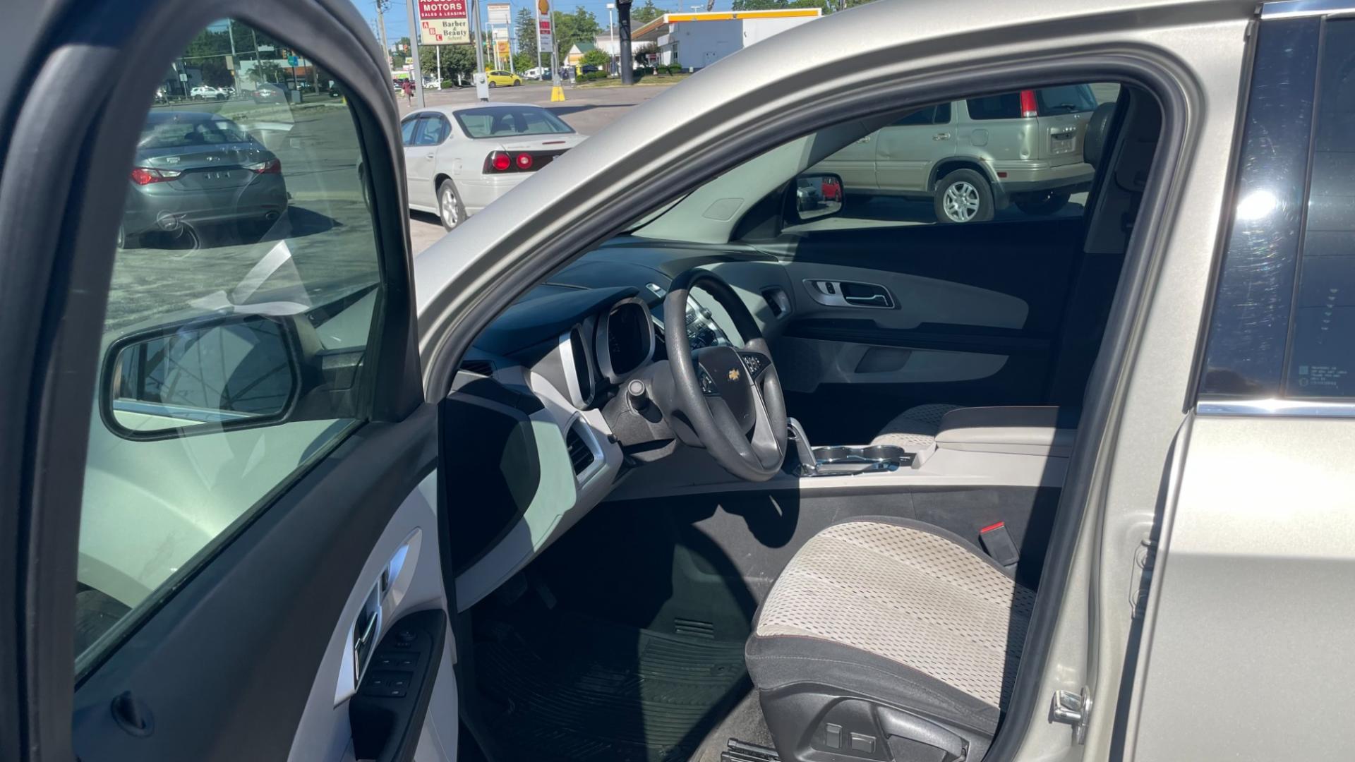 2015 Gold /BLACK Chevrolet Equinox LS (2GNALAEK8F6) with an 2.4L L4 DOHC 16V engine, 6-Speed Automatic transmission, located at 2710A Westlane Rd., Indianapolis, IN, 46268, (317) 291-2000, 39.885670, -86.208160 - Photo#6