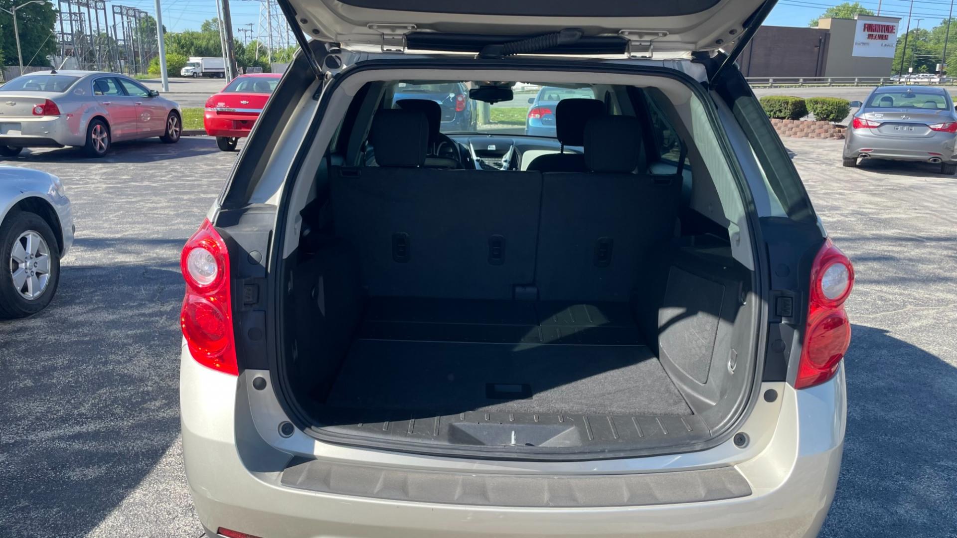 2015 Gold /BLACK Chevrolet Equinox LS (2GNALAEK8F6) with an 2.4L L4 DOHC 16V engine, 6-Speed Automatic transmission, located at 2710A Westlane Rd., Indianapolis, IN, 46268, (317) 291-2000, 39.885670, -86.208160 - Photo#9