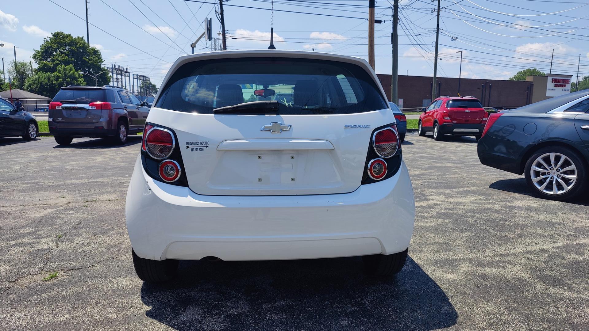 2014 WHITE /GRAY Chevrolet Sonic (1G1JA6SH6E4) , located at 2710A Westlane Rd., Indianapolis, IN, 46268, (317) 291-2000, 39.885670, -86.208160 - Photo#4