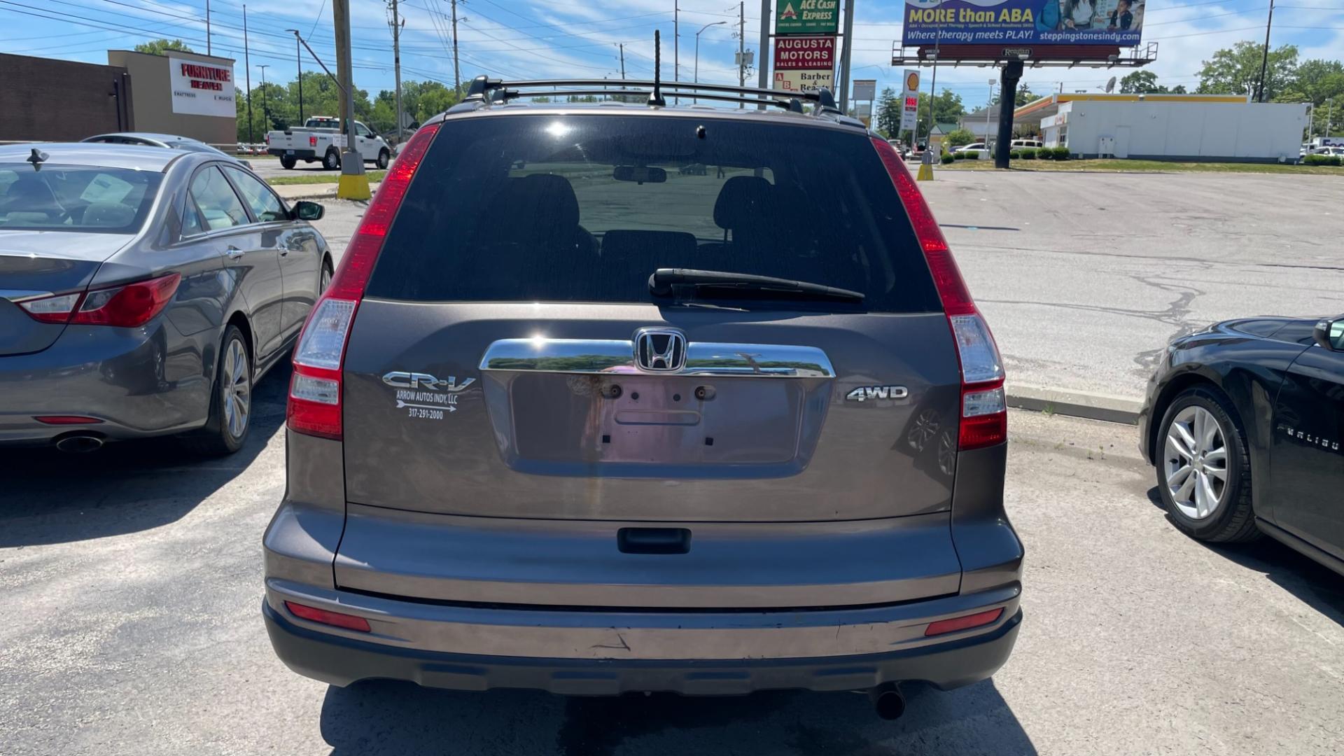 2010 BRONZE Honda CR-V EX (3CZRE4H53AG) with an 2.4L L4 DOHC 16V engine, 4-Speed Automatic transmission, located at 2710A Westlane Rd., Indianapolis, IN, 46268, (317) 291-2000, 39.885670, -86.208160 - Photo#5