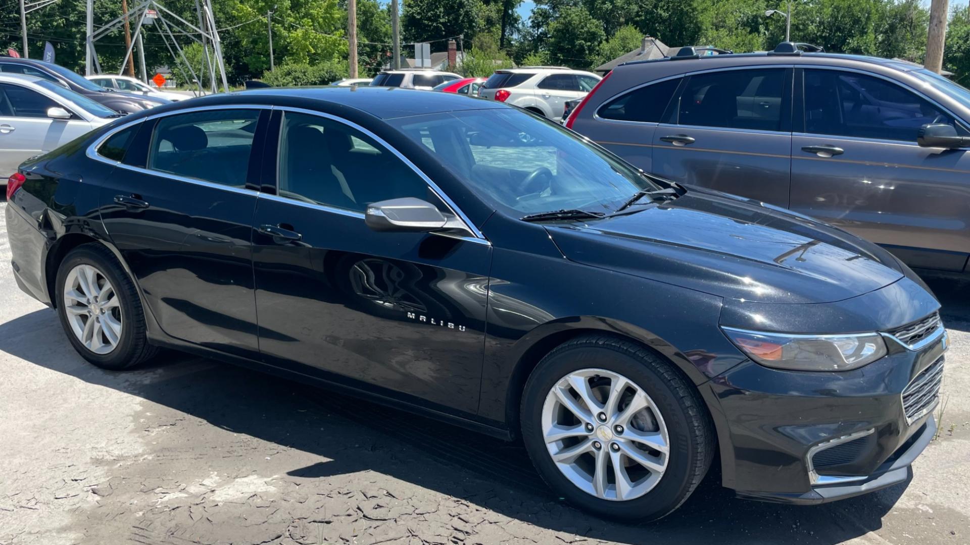 2016 BLACK /BLACK Chevrolet Malibu LT (1G1ZE5ST7GF) with an 4 CYL TURBO 1.5 LITER engine, 6-Speed Automatic transmission, located at 2710A Westlane Rd., Indianapolis, IN, 46268, (317) 291-2000, 39.885670, -86.208160 - Photo#2