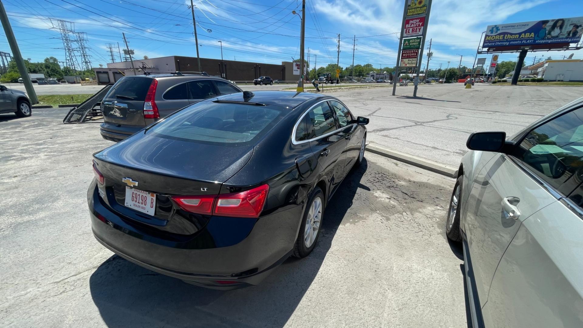 2016 BLACK /BLACK Chevrolet Malibu LT (1G1ZE5ST7GF) with an 4 CYL TURBO 1.5 LITER engine, 6-Speed Automatic transmission, located at 2710A Westlane Rd., Indianapolis, IN, 46268, (317) 291-2000, 39.885670, -86.208160 - Photo#4