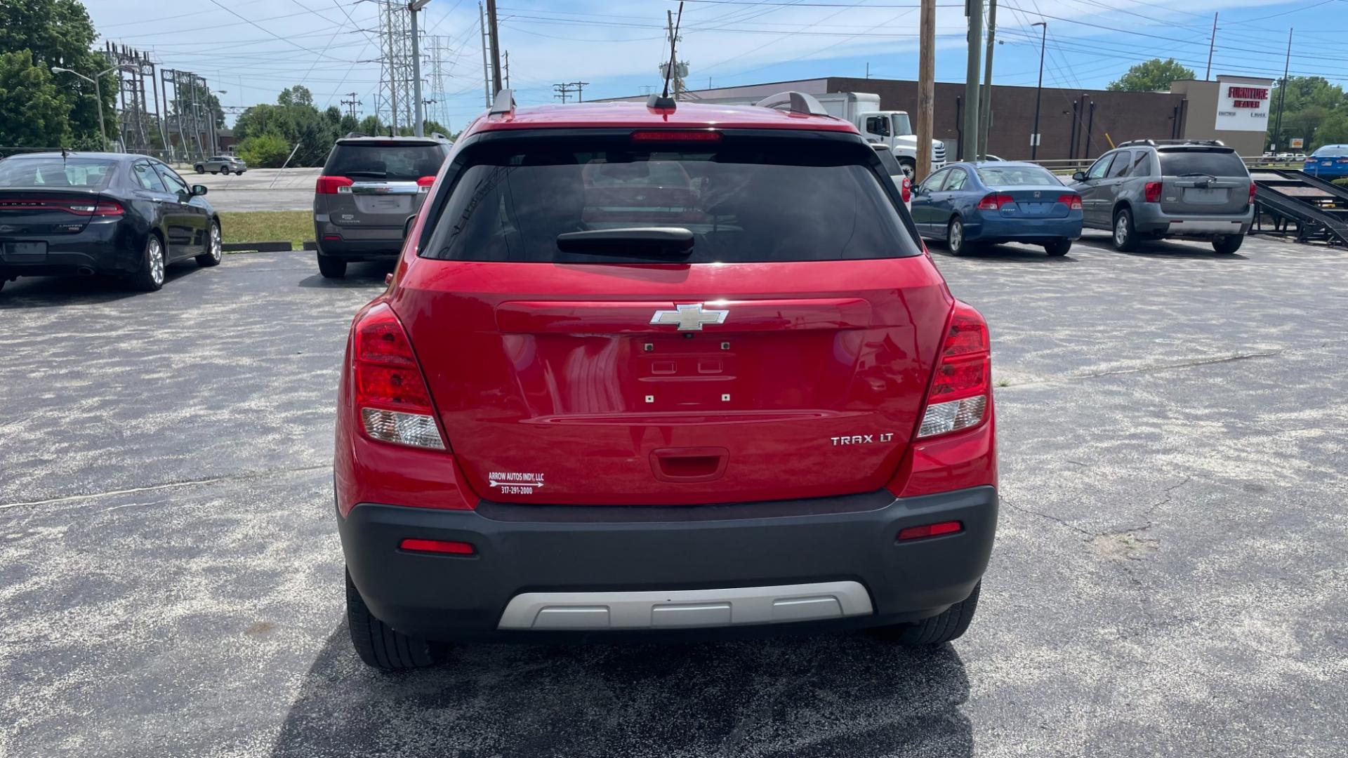 2016 RED /GRAY Chevrolet Trax LT (KL7CJLSB2GB) with an 1.4 engine, 6-Speed Automatic transmission, located at 2710A Westlane Rd., Indianapolis, IN, 46268, (317) 291-2000, 39.885670, -86.208160 - Photo#3