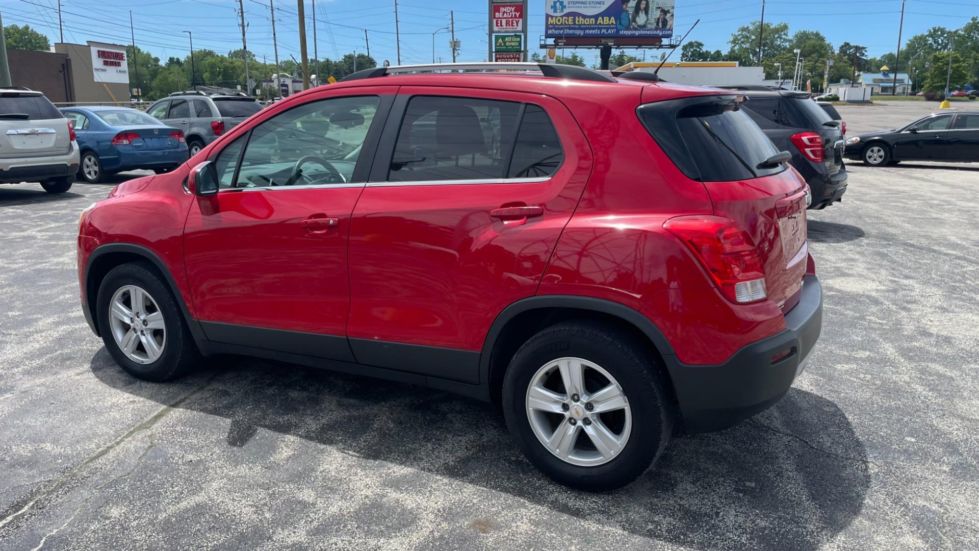 2016 RED /GRAY Chevrolet Trax LT (KL7CJLSB2GB) with an 1.4 engine, 6-Speed Automatic transmission, located at 2710A Westlane Rd., Indianapolis, IN, 46268, (317) 291-2000, 39.885670, -86.208160 - Photo#4