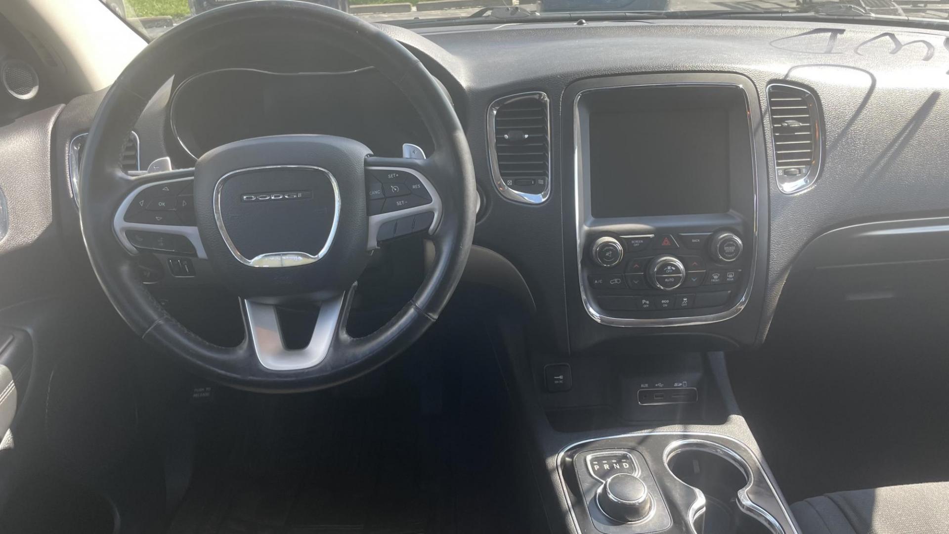 2014 Dodge Durango SXT (1C4RDJAG7EC) with an 3.6L V6 DOHC 24V engine, 8 SPEED AUTOMATIC transmission, located at 2710A Westlane Rd., Indianapolis, IN, 46268, (317) 291-2000, 39.885670, -86.208160 - ALL WHEEL DRIVE 7 PASSENGER SEATING REAR TEMPERATURE CONTROLS PUSH START TOUCH SCREEN RADIO - Photo#8