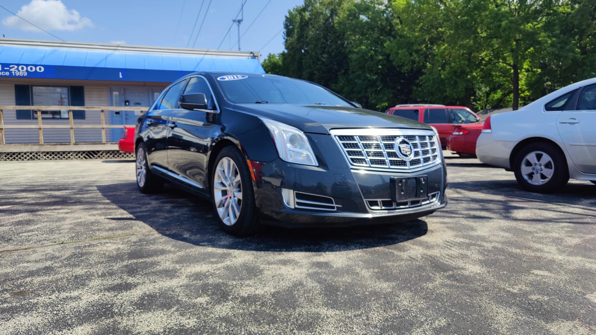 2015 BLACK /TAN / BLACK Cadillac XTS XTS (2G61N5S35F9) with an 3.6L V6 DOHC 24V engine, 6-Speed Automatic transmission, located at 2710A Westlane Rd., Indianapolis, IN, 46268, (317) 291-2000, 39.885670, -86.208160 - Alarm System Bluetooth Streaming Audio Bluetooth Wireless Technology Cruise Control Dual Power Front Seats Folding Rear Seat Hands Free Phone Heated Rear Seats Heated Seats Heated Steering Wheel Integrated Garage Door Opener Internet Access Leather Seats Leather-Wrapped Steering Wheel - Photo#0