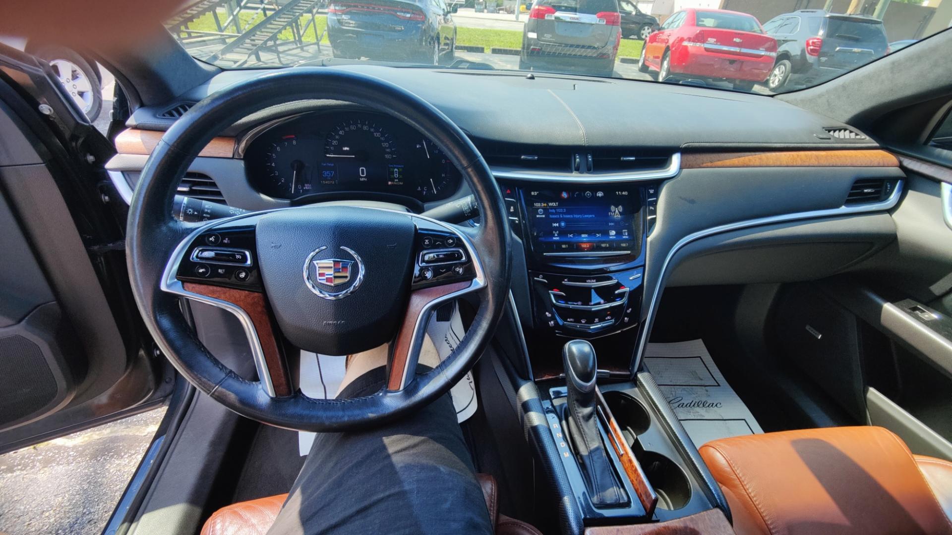 2015 BLACK /TAN / BLACK Cadillac XTS XTS (2G61N5S35F9) with an 3.6L V6 DOHC 24V engine, 6-Speed Automatic transmission, located at 2710A Westlane Rd., Indianapolis, IN, 46268, (317) 291-2000, 39.885670, -86.208160 - Alarm System Bluetooth Streaming Audio Bluetooth Wireless Technology Cruise Control Dual Power Front Seats Folding Rear Seat Hands Free Phone Heated Rear Seats Heated Seats Heated Steering Wheel Integrated Garage Door Opener Internet Access Leather Seats Leather-Wrapped Steering Wheel - Photo#4