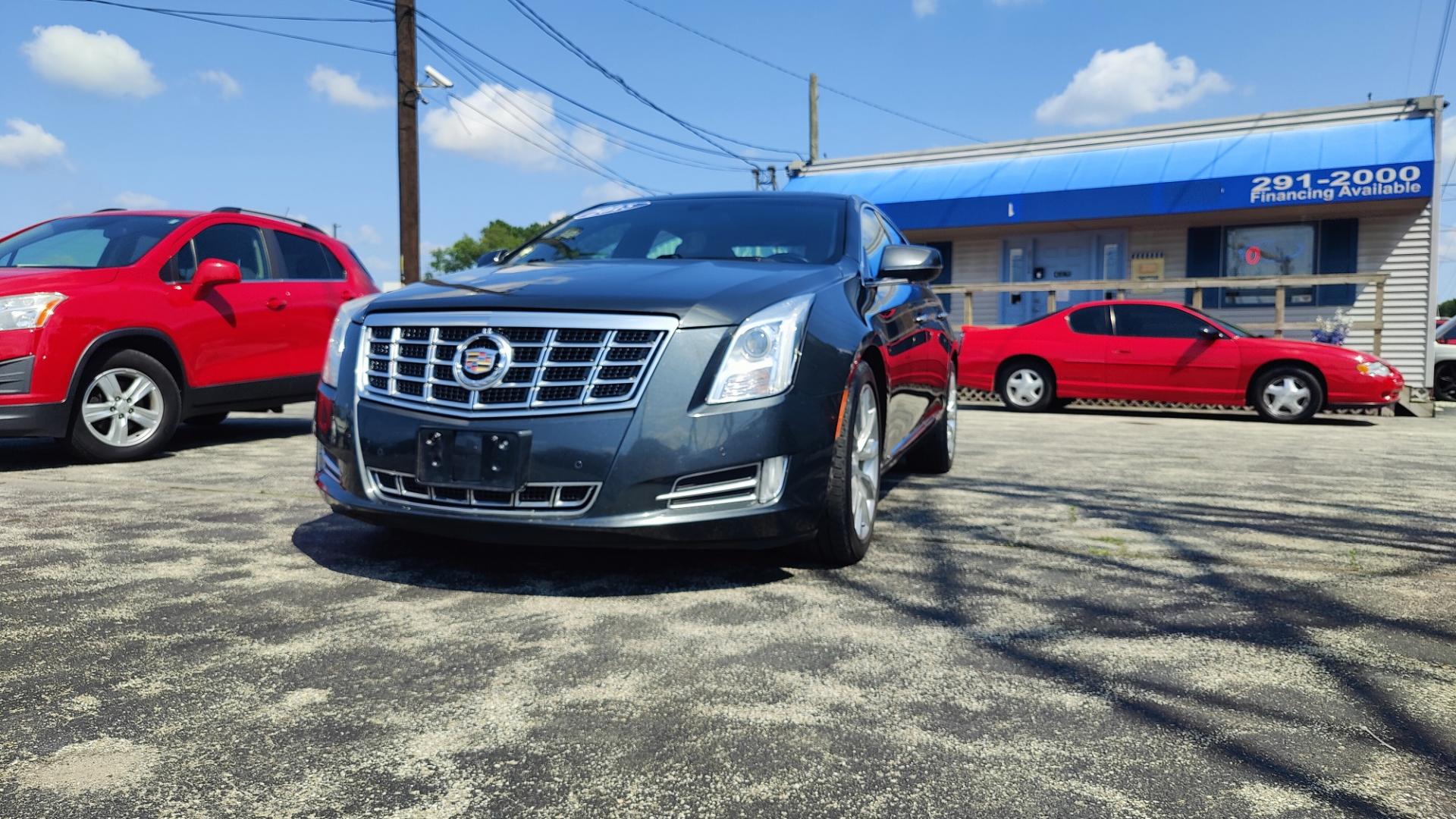 2015 BLACK /TAN / BLACK Cadillac XTS XTS (2G61N5S35F9) with an 3.6L V6 DOHC 24V engine, 6-Speed Automatic transmission, located at 2710A Westlane Rd., Indianapolis, IN, 46268, (317) 291-2000, 39.885670, -86.208160 - Alarm System Bluetooth Streaming Audio Bluetooth Wireless Technology Cruise Control Dual Power Front Seats Folding Rear Seat Hands Free Phone Heated Rear Seats Heated Seats Heated Steering Wheel Integrated Garage Door Opener Internet Access Leather Seats Leather-Wrapped Steering Wheel - Photo#1