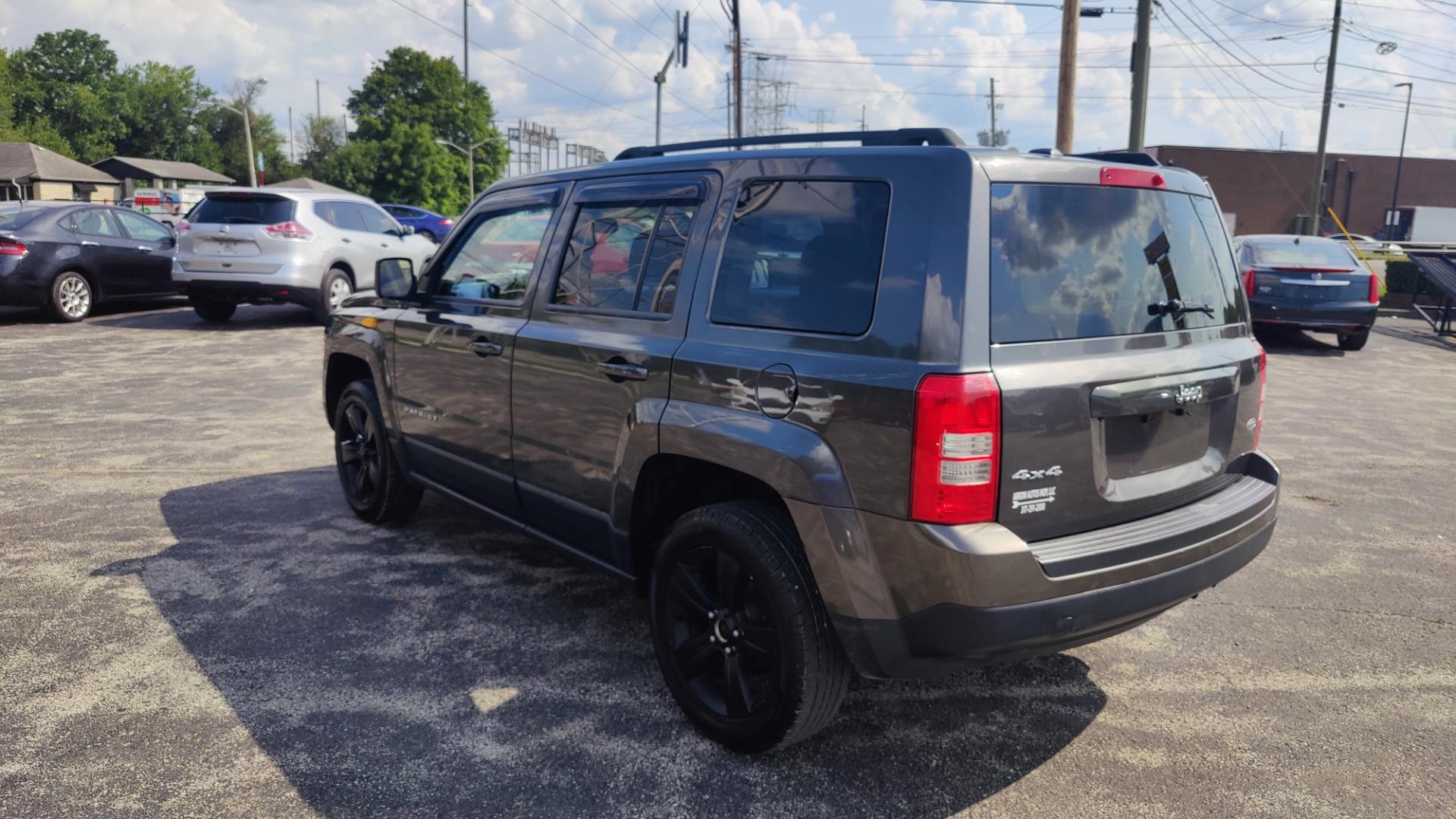 2014 GRAY /BLACK Jeep Patriot LATITUDE (1C4NJRFBXED) with an 2.4L L4 DOHC 16V engine, 6-Speed Automatic transmission, located at 2710A Westlane Rd., Indianapolis, IN, 46268, (317) 291-2000, 39.885670, -86.208160 - Photo#3