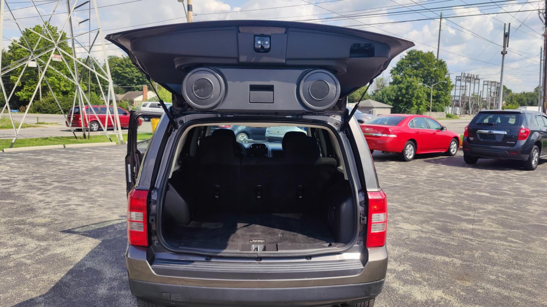 2014 GRAY /BLACK Jeep Patriot LATITUDE (1C4NJRFBXED) with an 2.4L L4 DOHC 16V engine, 6-Speed Automatic transmission, located at 2710A Westlane Rd., Indianapolis, IN, 46268, (317) 291-2000, 39.885670, -86.208160 - Photo#6