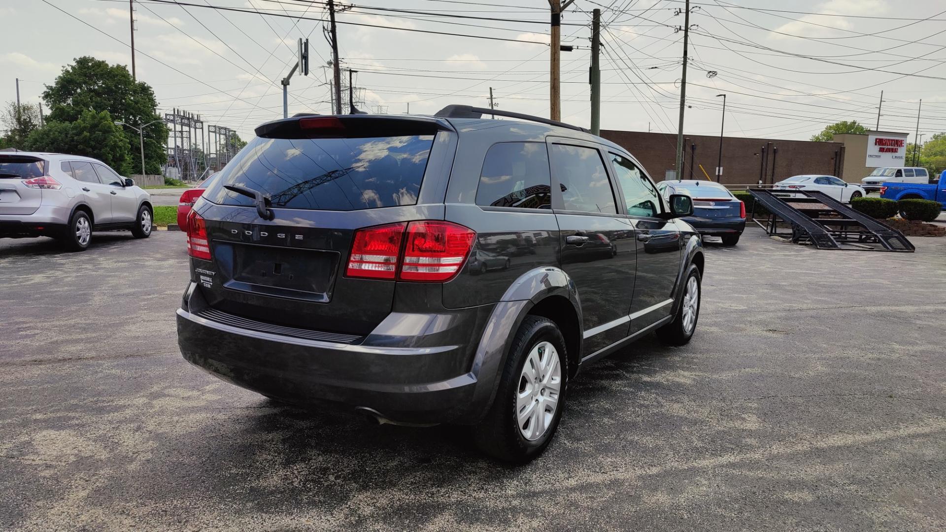 2016 GRAY /GRAY Dodge Journey SE (3C4PDCAB4GT) with an 2.4L L4 DOHC 16V engine, 6-Speed Automatic transmission, located at 2710A Westlane Rd., Indianapolis, IN, 46268, (317) 291-2000, 39.885670, -86.208160 - Photo#2