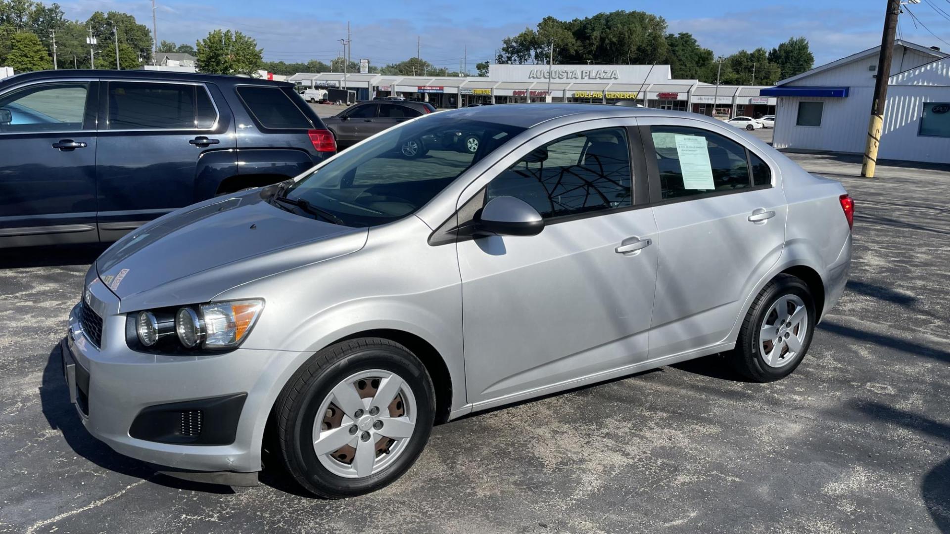 2016 WHITE /GRAY Chevrolet Sonic LS (1G1JA5SH2G4) with an 1.8 LITER engine, 6-Speed Automatic transmission, located at 2710A Westlane Rd., Indianapolis, IN, 46268, (317) 291-2000, 39.885670, -86.208160 - Photo#1