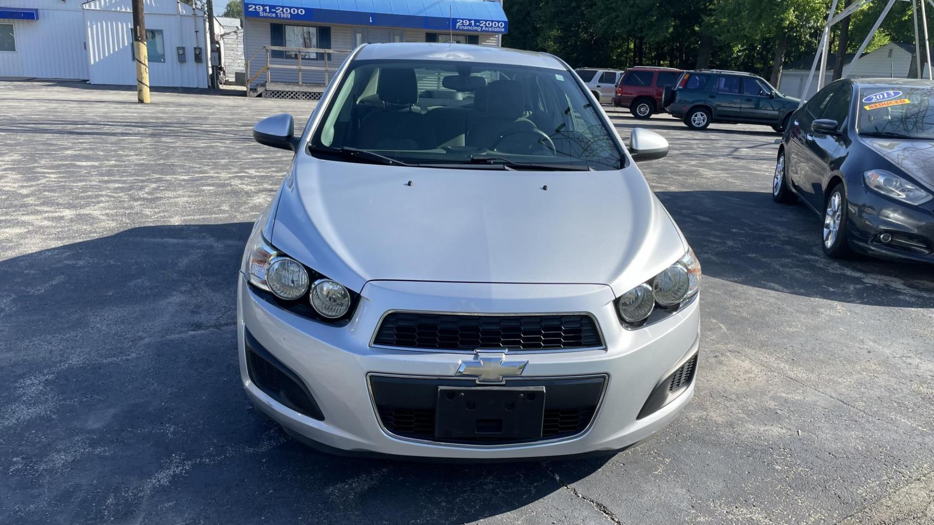 2016 WHITE /GRAY Chevrolet Sonic LS (1G1JA5SH2G4) with an 1.8 LITER engine, 6-Speed Automatic transmission, located at 2710A Westlane Rd., Indianapolis, IN, 46268, (317) 291-2000, 39.885670, -86.208160 - Photo#2