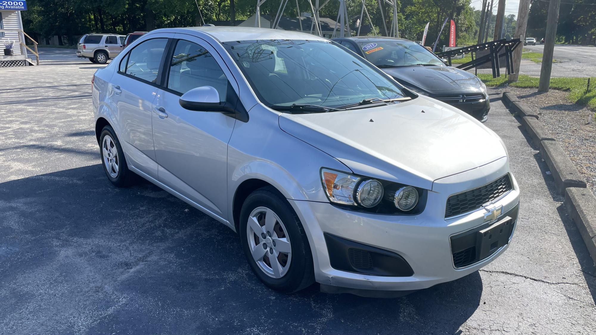 photo of 2016 Chevrolet Sonic LS Auto Sedan / OUTSIDE FINANCING / WARRANTY, GAP, ROADSIDE ASSISTANCE AVAILABLE