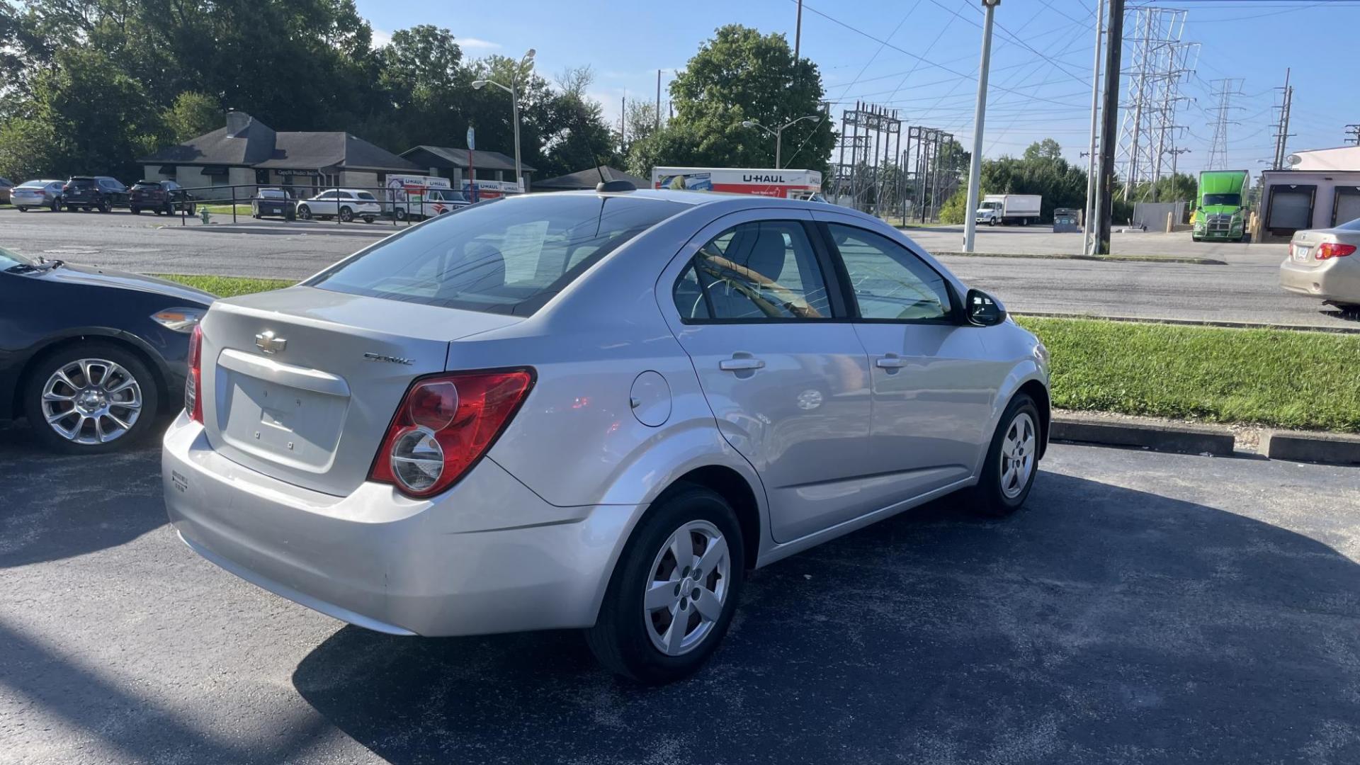 2016 WHITE /GRAY Chevrolet Sonic LS (1G1JA5SH2G4) with an 1.8 LITER engine, 6-Speed Automatic transmission, located at 2710A Westlane Rd., Indianapolis, IN, 46268, (317) 291-2000, 39.885670, -86.208160 - Photo#5