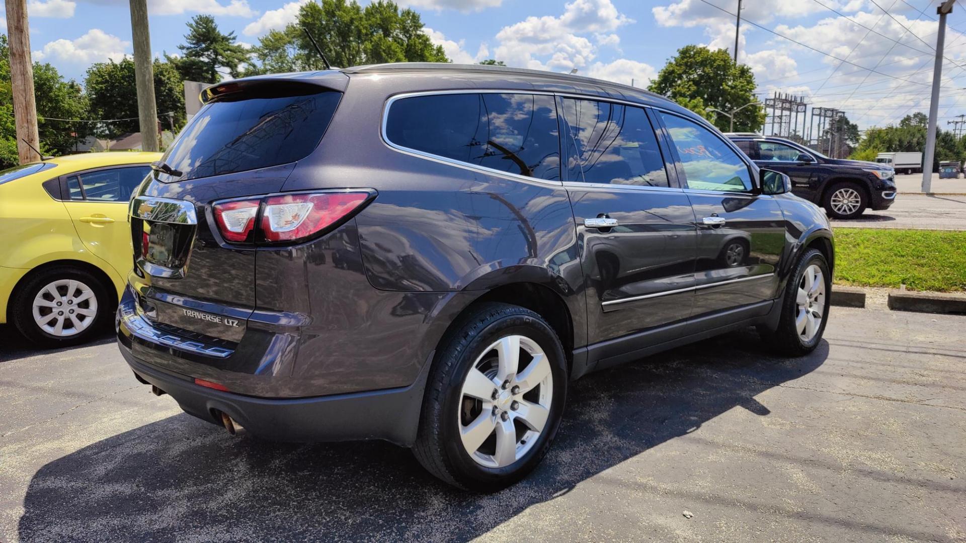 2014 /GRAY Chevrolet Traverse LTZ AWD (1GNKVJKD4EJ) with an 3.6L V6 DOHC 24V engine, 6-Speed Automatic transmission, located at 2710A Westlane Rd., Indianapolis, IN, 46268, (317) 291-2000, 39.885670, -86.208160 - 3RD ROW SEATING - Photo#2