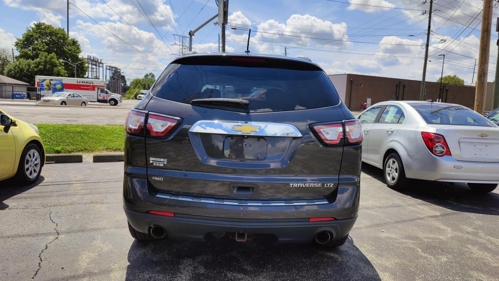 2014 /GRAY Chevrolet Traverse LTZ AWD (1GNKVJKD4EJ) with an 3.6L V6 DOHC 24V engine, 6-Speed Automatic transmission, located at 2710A Westlane Rd., Indianapolis, IN, 46268, (317) 291-2000, 39.885670, -86.208160 - 3RD ROW SEATING - Photo#3