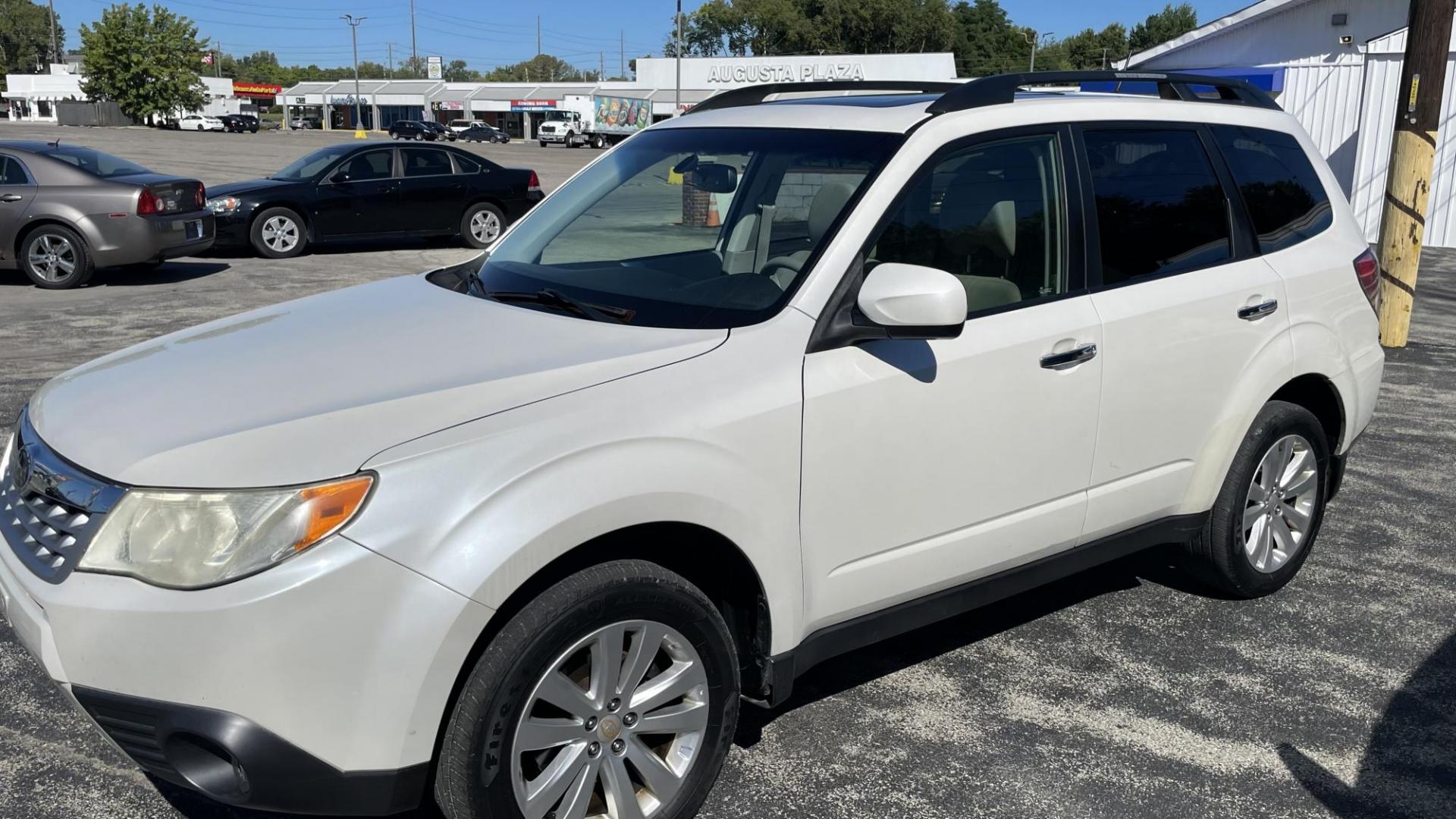 2012 Subaru Forester 2.5X Limited (JF2SHBEC9CH) with an 2.5L H4 SOHC 16V engine, 4-Speed Automatic transmission, located at 2710A Westlane Rd., Indianapolis, IN, 46268, (317) 291-2000, 39.885670, -86.208160 - Photo#0