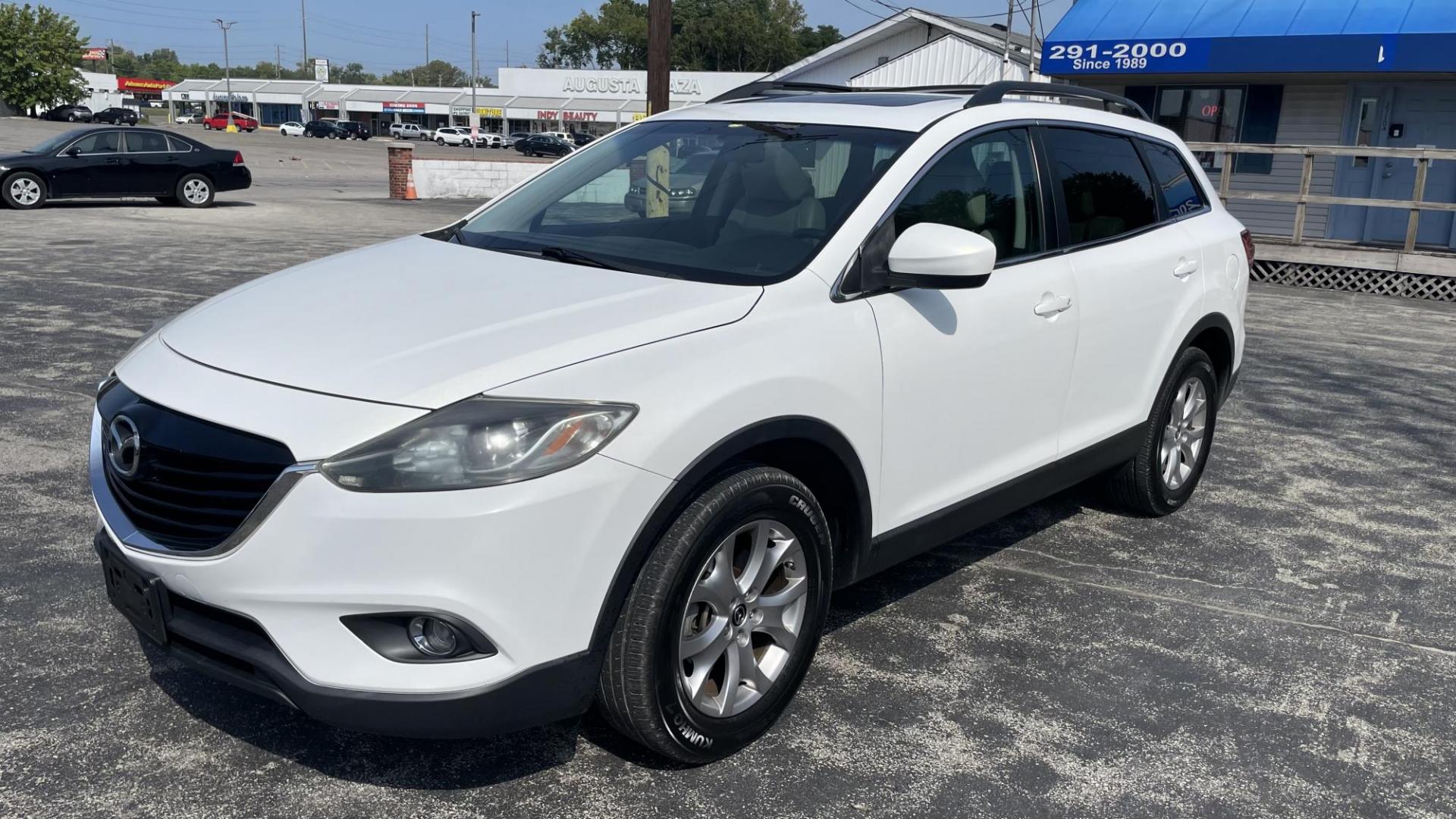 2015 Mazda CX-9 Touring AWD (JM3TB3CV3F0) with an 3.7L V6 DOHC 24V engine, 6-Speed Automatic transmission, located at 2710A Westlane Rd., Indianapolis, IN, 46268, (317) 291-2000, 39.885670, -86.208160 - Photo#1