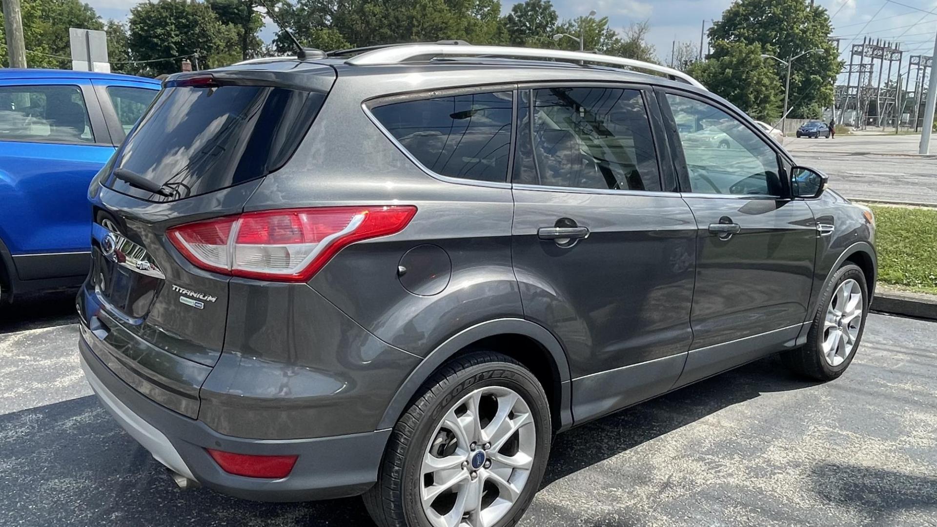 2016 Ford Escape Titanium 4WD (1FMCU9J97GU) with an 2.0L L4 DOHC 16V engine, 6-Speed Automatic transmission, located at 2710A Westlane Rd., Indianapolis, IN, 46268, (317) 291-2000, 39.885670, -86.208160 - Photo#2